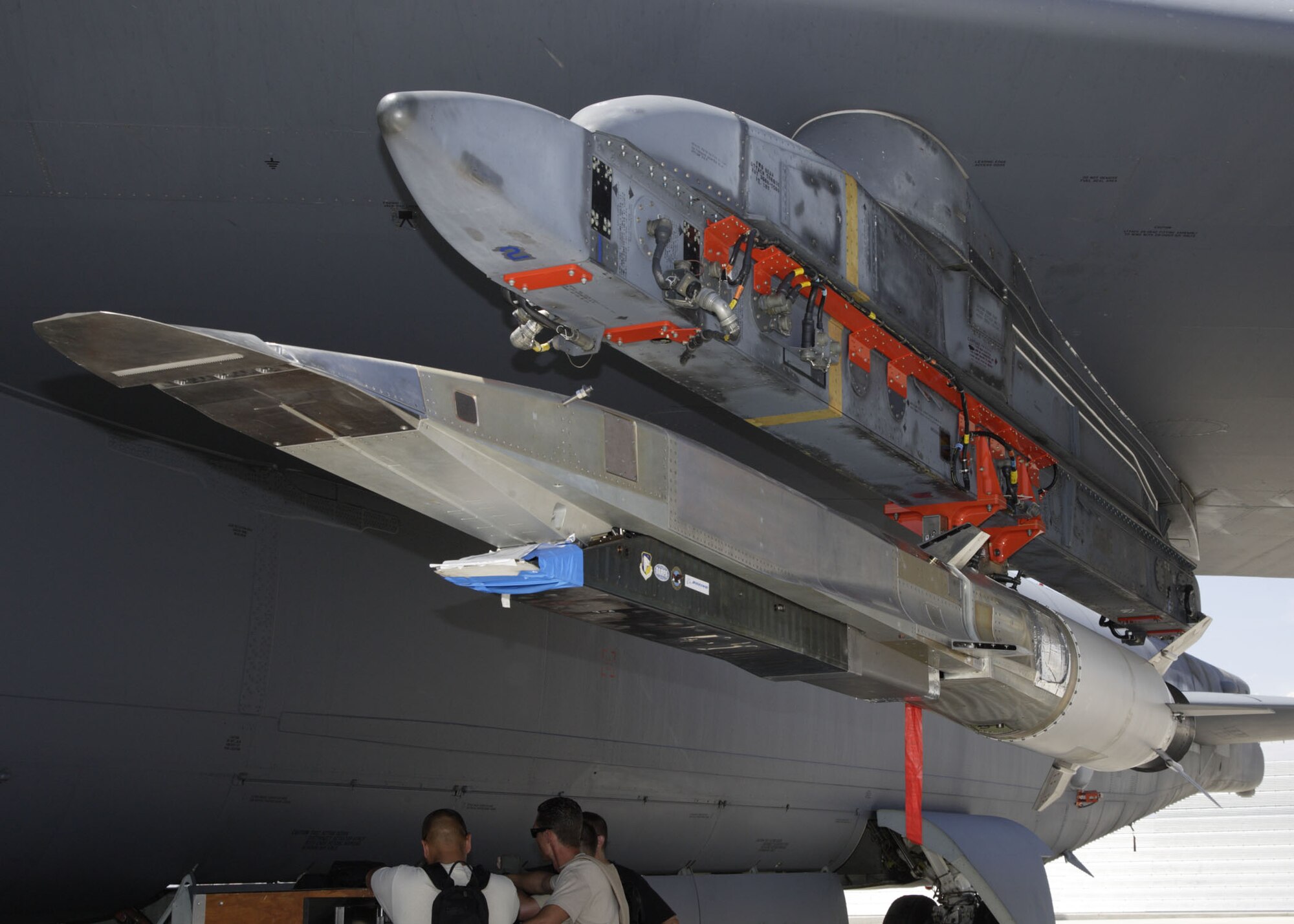An X-51A WaveRider hypersonic flight test vehicle is uploaded to an Air Force Flight Test Center B-52 for fit testing at Edwards Air Force Base on July 17, 2009.  Four scramjet-powered Waveriders were built for the Air Force. The Air Force Research Laboratory, DARPA, Pratt & Whitney Rocketdyne, and Boeing are partners on the X-51A technology demonstrator program. (U.S. Air Force photo/Chad Bellay)
