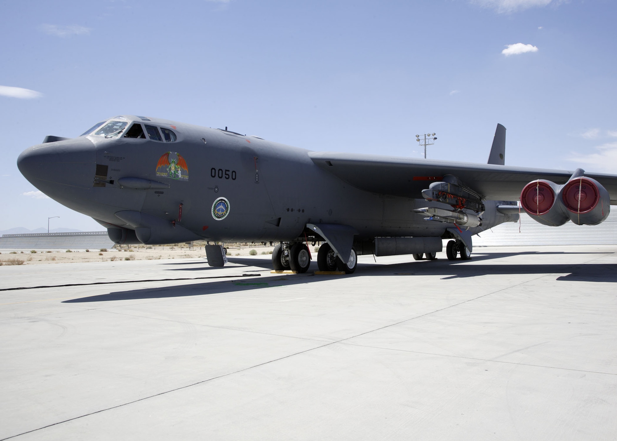 The X-51A WaveRider hypersonic flight test vehicle was uploaded to an Air Force Flight Test Center B-52 for fit testing at Edwards Air Force Base on July 17.  Two B-52 flights, one captive carriage and one dress rehearsal, are planned this fall prior to the X-51's first hypersonic scramjet flight over the Pacific Ocean scheduled in December.  The Air Force Research Laboratory, DARPA, Pratt & Whitney Rocketdyne, and Boeing are partnering on the X-51A technology demonstrator program. (U.S. Air Force photo/Chad Bellay)
