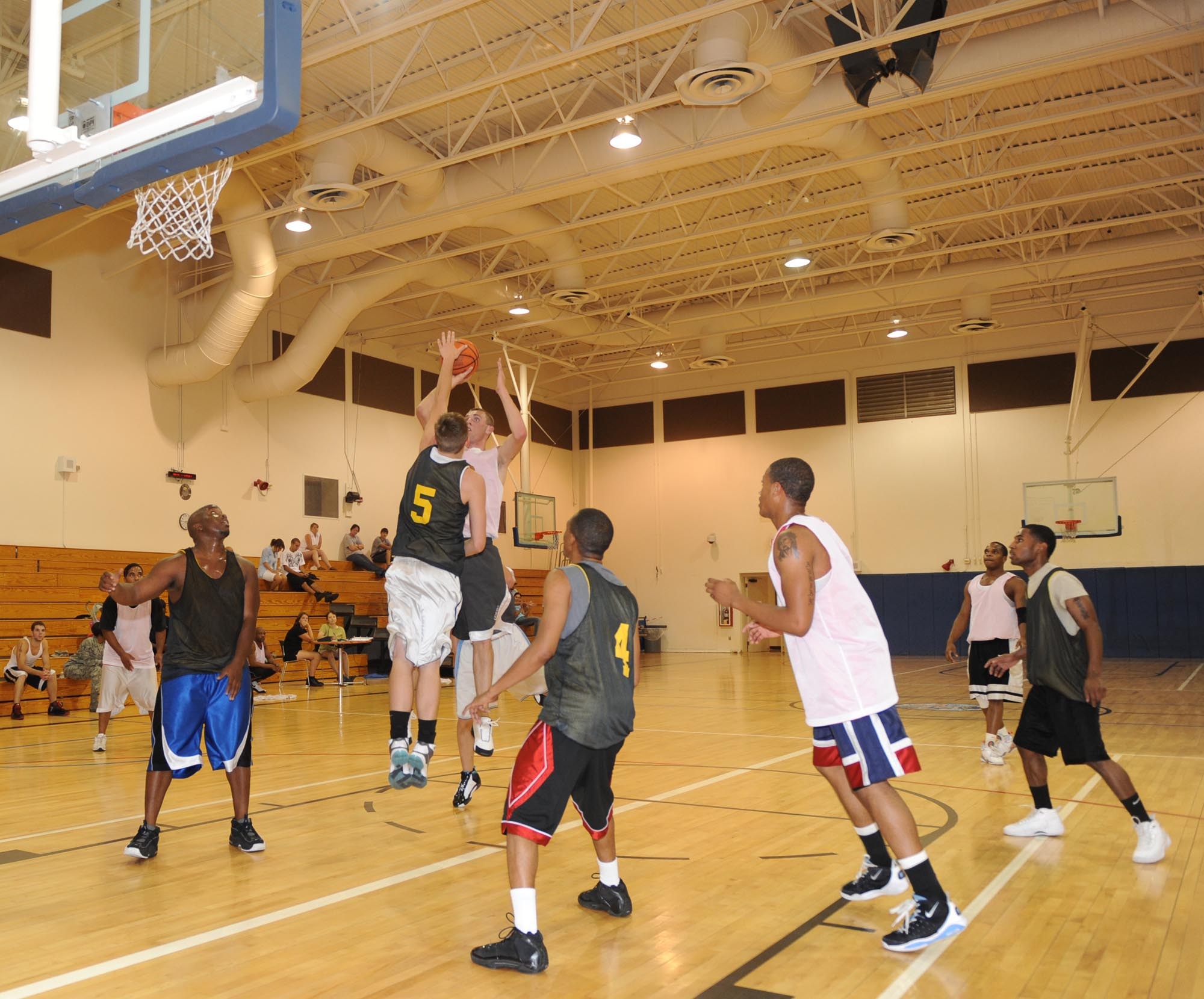 MOUNTAIN HOME AIR FORCE BASE, Idaho -- Jeb Snow, The Bulldogs, pulls up for a jump shot during a base summer league basketball game at the Gunfighter Fitness Center July 30. The Underdogs beat the Bulldogs 47-42. (U.S. Air Force photo by Airman 1st Class Renishia Richardson)
