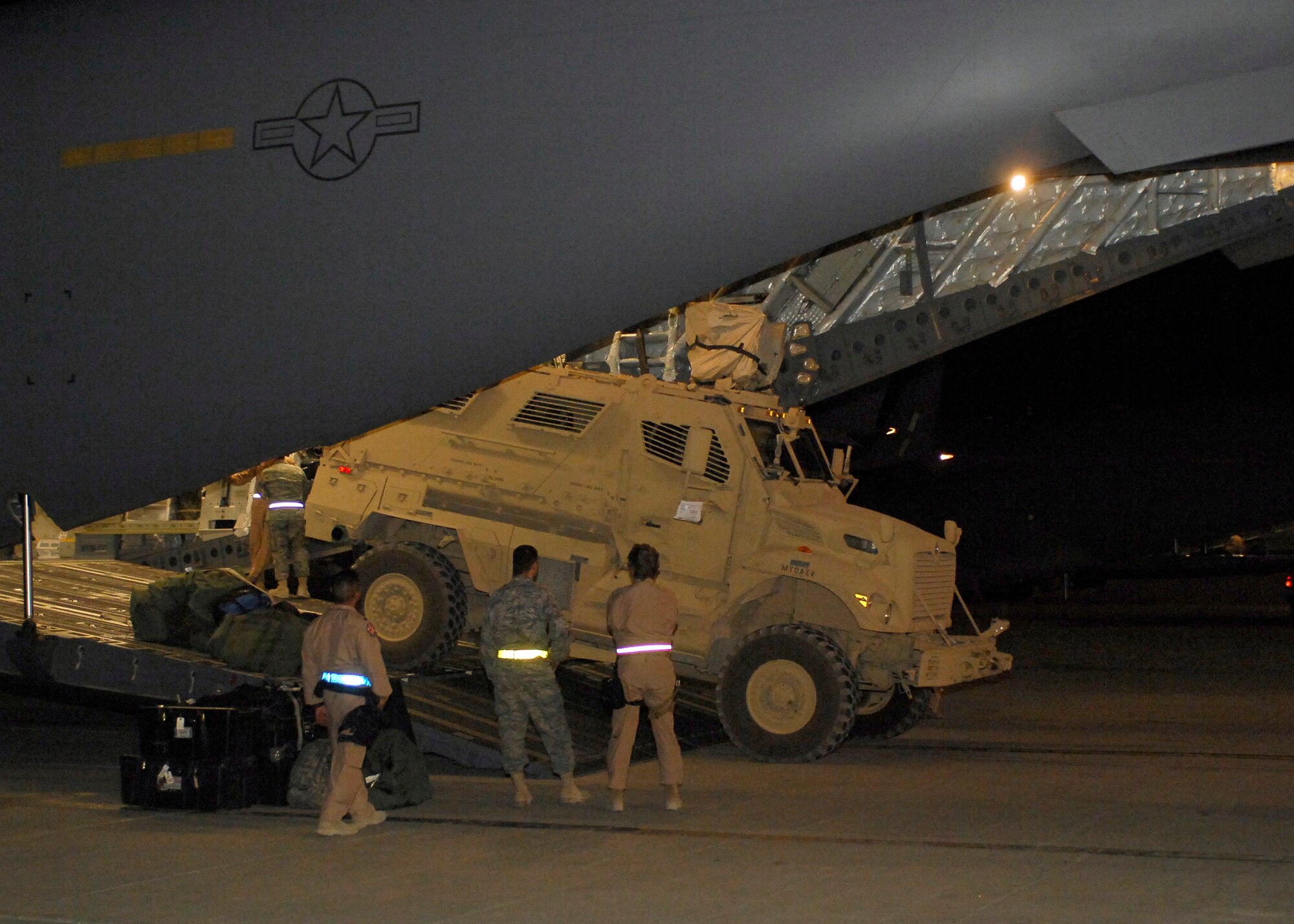 A C-17 Globemaster lll delivers Mine Resistant Ambush Protected Vehicles, or MRAPS, to Bagram Airfield Aug.4. The MRAPS are designed to be both safe and effective for Soldiers conducting patrols, convoy security and other missions throughout Afghanistan. The C-17's mission is to perform tactical airlift and airdrop missions and can also transport litters and ambulatory patients during aeromedical evacuations when required. (U.S. Air Force photo/Senior Airman Felicia Juenke)