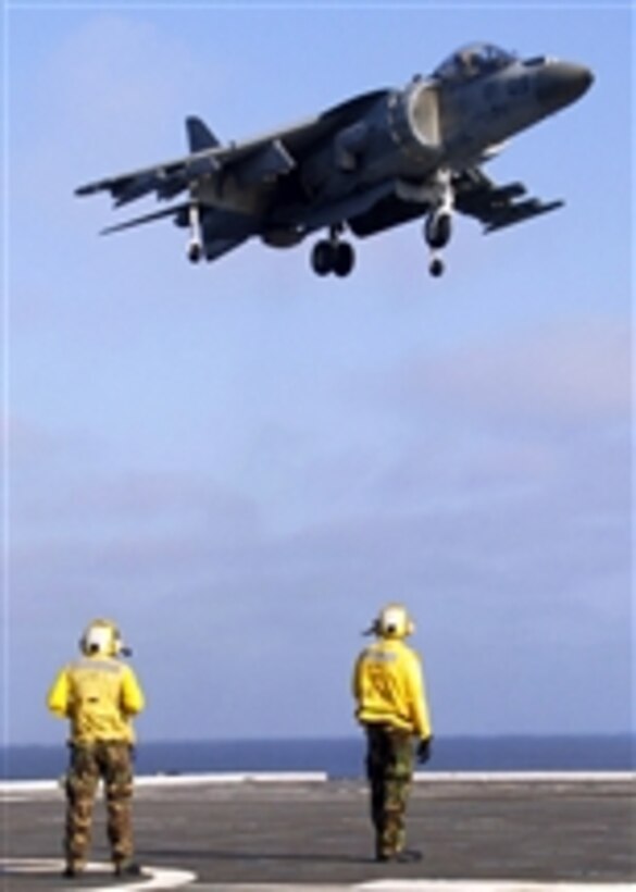 A U.S. Marine Corps AV-8B Harrier aircraft, assigned to Marine Medium Helicopter Squadron 166, takes off from the amphibious transport dock ship USS Cleveland (LPD 7) underway in the Pacific Ocean on July 26, 2009.  The Cleveland, assigned to the Bonhomme Richard Amphibious Readiness Group, is conducting a composite training unit exercise in preparation for a deployment to the western Pacific Ocean later this year.  