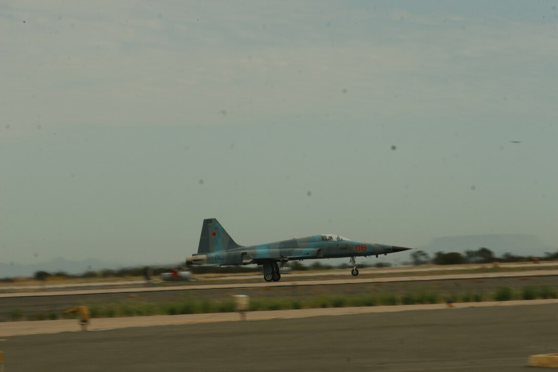 A pilot with Marine Fighter Training Squadron 401 lands a F-5 after completing a training flight with Marine Fighter Attack Squadron 232, aboard the air station, Aug. 4. The squadron often trains with Miramar squadrons over California's deserts.  (Official U.S. Marine Corps photo by Cpl. Christopher O'Quin)(Released)