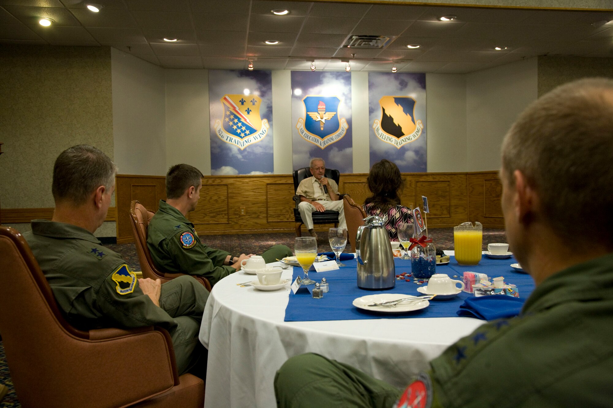 Retired Col. Phil Adair, an original 89th Fighter Squadron pilot, shares his story as a Burma Banshee during World War II at a heritage breakfast July 31. The Banshees' name carried on to the 89th Flying Training Squadron, the last home of the dependable T-37B Tweet, which was officially retire from active service 31. (U.S. Air Force photo/Lt. Col. Ternell Washington) 