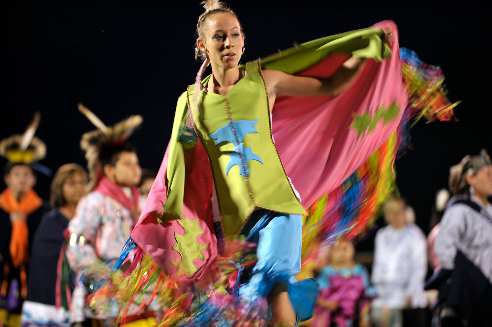 A Native American dancer gives a colorful performance during the Kaw Nation's annual Intertribal Pow Wow near Kaw City, Okla., on Aug. 2. Like its home state of Kansas, the 931st Air Refueling Group draws its identity from the proud Kanza people of the Kaw Nation. "Kanza" is the official call sign of 931st ARG missions. (U.S. Air Force photo/Tech. Sgt. Jason Schaap) 
