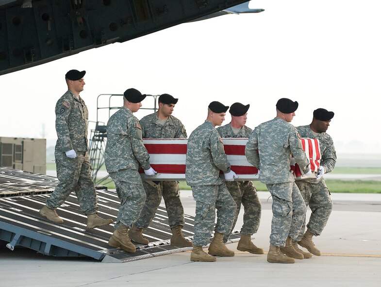 A U.S. Army carry team transfers the remains of Army Corporal Jonathan Michael Walls, of West Lawn, Pa., at Dover Air Force Base, Del., August 4. Corporal Walls was assigned to the 1st Battalion, 12th Infantry Regiment, 4th Brigade Combat Team, 4th Infantry Division, Fort Carson, Colo. (U.S. Air Force photo/Jason Minto)
 
