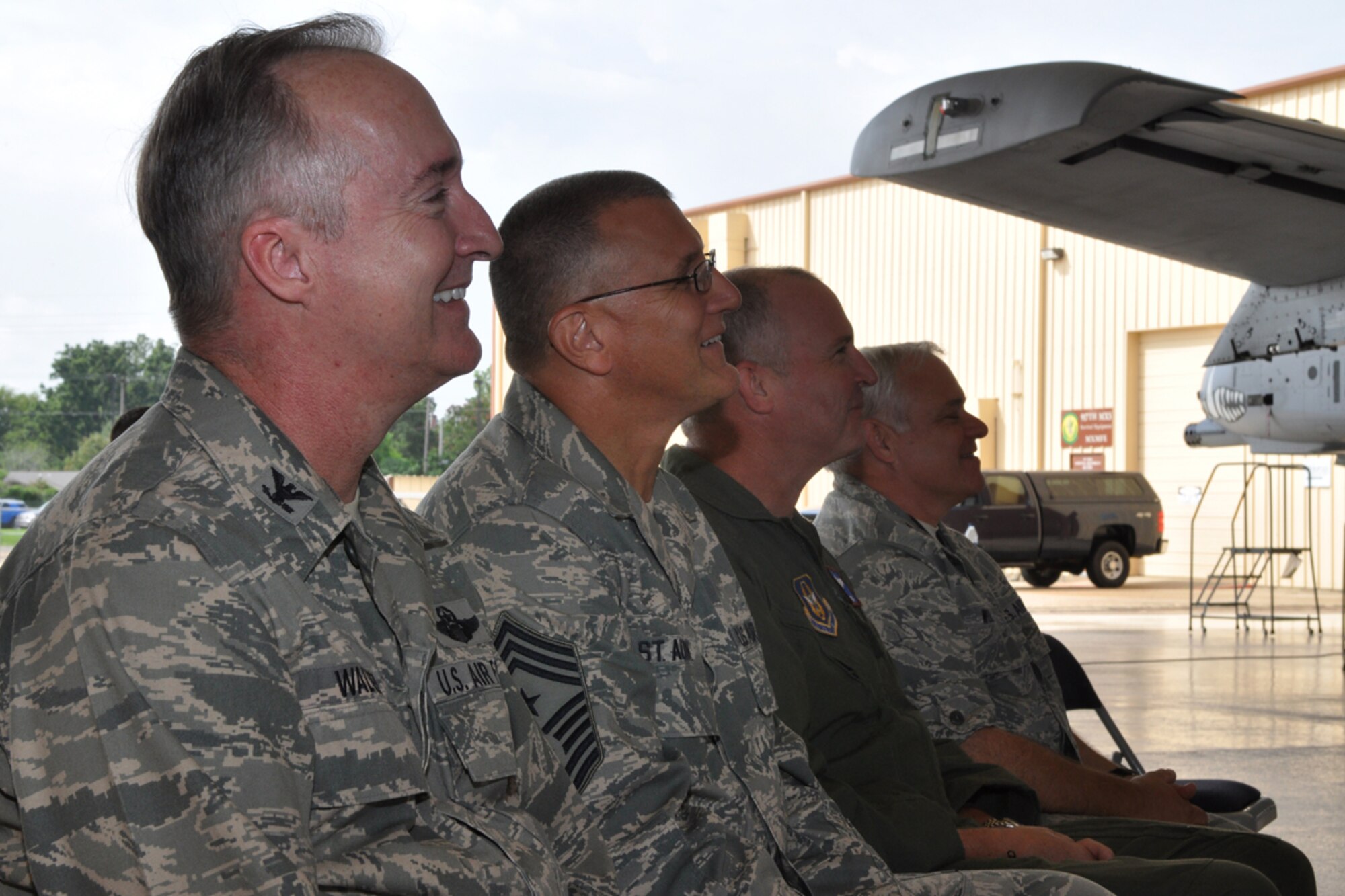 Colonel Edmund Walker, commander, 917th Wing, Chief Master Sgt. Keith St. Aubin, command chief, 917th Wing, Colonel Robert Nordberg, commander, 917th Operations Group, and Colonel Kevin Wolfe, commander, 917th Mission Support Group enjoy a lighter moment during the change of commander ceremony for the 717th Aircraft Maintenance Squadron at Barksdale Air Force base, La., Sunday, August 2, 2009. Lt. Col. Chris Evers relinquished command of the 717th AMXS to Maj. Michael R. Davis during the ceremony. (U.S. Air Force photo/Tech. Sgt. Jeff Walston)