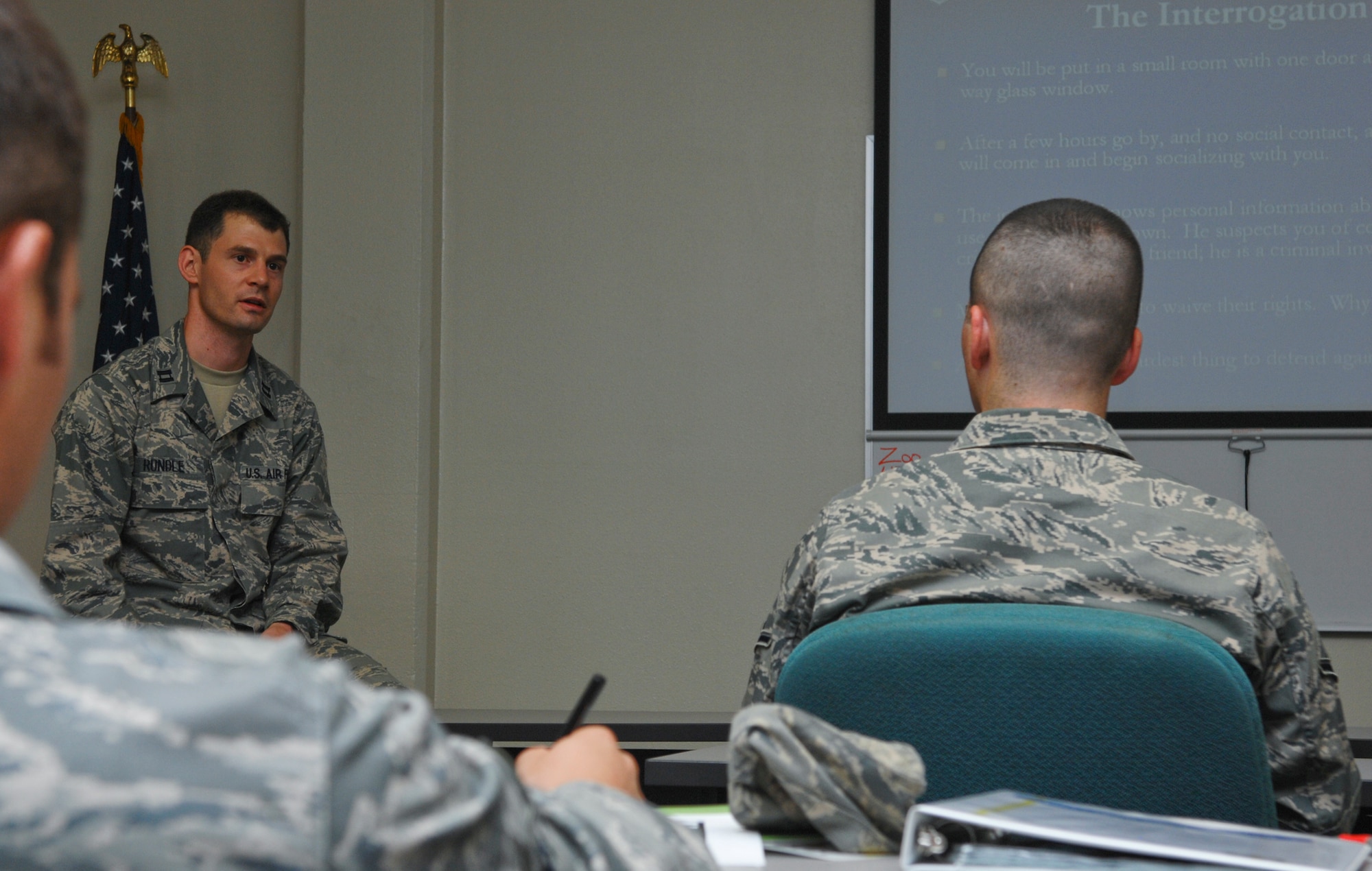 ELMENDORF AIR FORCE BASE, Alaska -- Capt. Seth Rundle briefs Airmen in the First Term Airman's Center here about the Area Defense Counsel mission. Rundle is Elmendorf's Area Defense Counsel. (U.S. Air Force photo/Senior Airman David Carbajal)