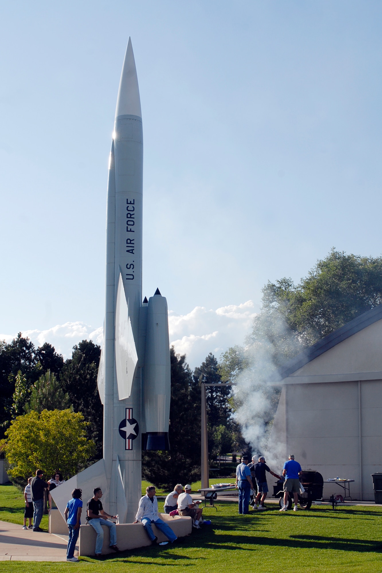 Peterson Air and Space Museum 2009 Concert in the Park patrons enjoy festivities near a missile at the base air park July 31. About 250 attendees along with approximately 60 volunteers including the Civil Air Patrol cadets gathered at the base air park for food and music. (Air Force photo by Larry Hulst)