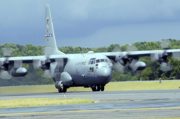 A C-130 taxies on the flight line at Robins July 31. It will be the first aircraft to undergo High Velocity Maintenance, which means it will be used to test the new method of programmed depot maintenance aimed at reducing aircraft downtime. (U. S. Air Force photo by Sue Sapp)