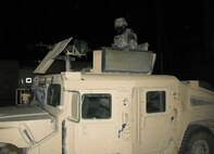 Staff Sgt. James Black, along with 12 members from the 512th Security Forces Squadron, returned from a deployment to Kirkuk Regional Air Base, Iraq, in July. This was the first deployment for the Lower Merion, Penn., policeman who enlisted into the Air Force Reserve in 2004. At Kirkuk AB, Sergeant Black patrolled the base perimeter and worked in the towers where he monitored the surrounding area for potential threats. (U.S. Air Force photo/Capt. Marnee A.C. Losurdo)