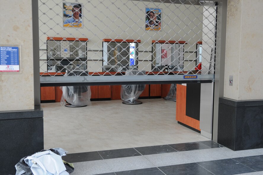 AAFES employees work to get the new Barber Shop open and ready for customers at the new Kaiserslautern Military Community Center, Ramstein Air Base, Germany, Aug. 3, 2009.  The Mall, food court, and concessions are part of the phase II openings in the KMCC scheduled to open 15 August. (U.S. Air Force photo by Airman 1st Class Caleb Pierce) 