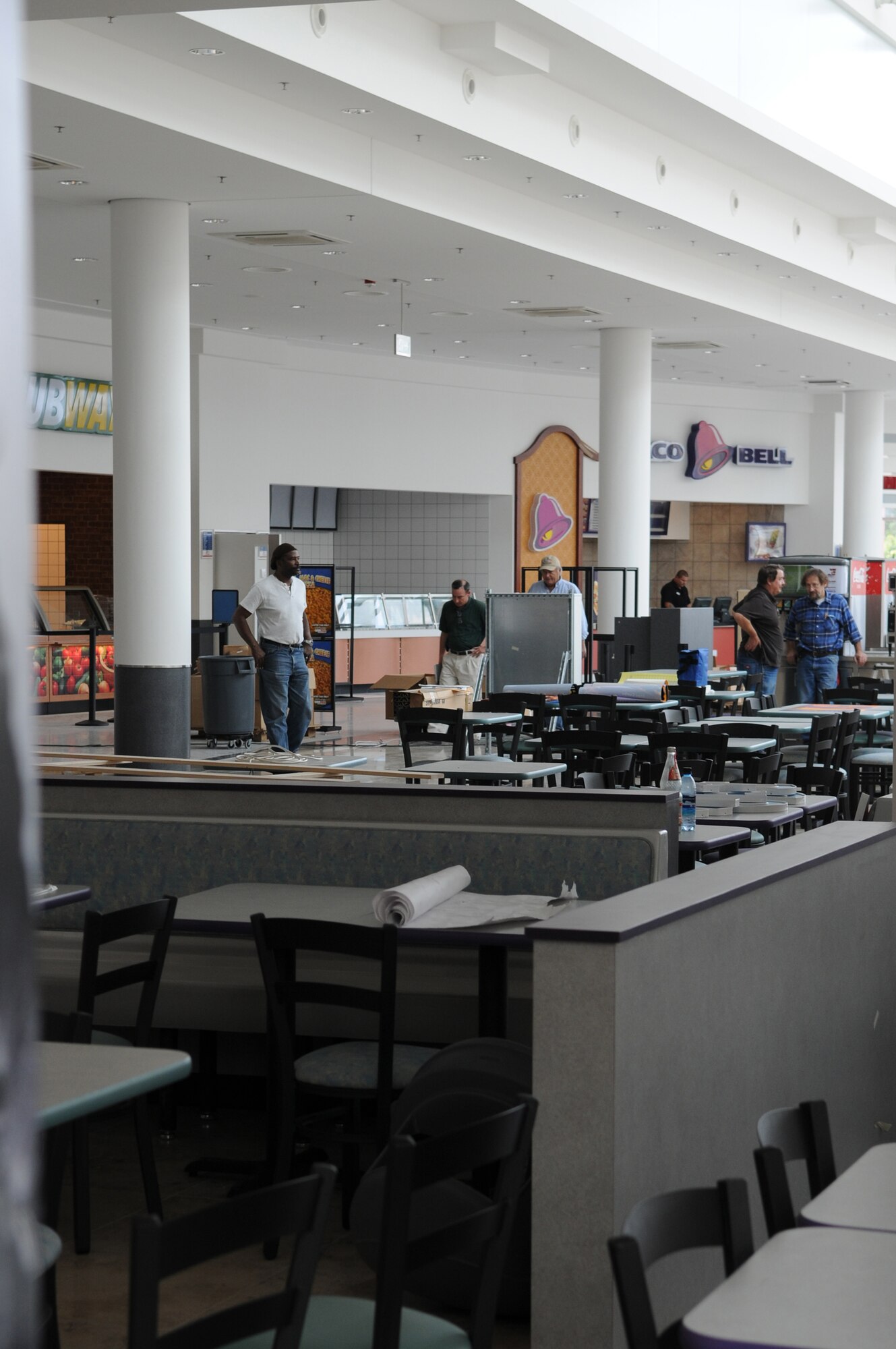 AAFES employees work to get the new food court open and ready for customers at the new Kaiserslautern Military Community Center, Ramstein Air Base, Germany, Aug. 3, 2009.  The food court, and concessions are part of the phase II openings in the KMCC scheduled to open 15 August. (U.S. Air Force photo by Airman 1st Class Caleb Pierce)