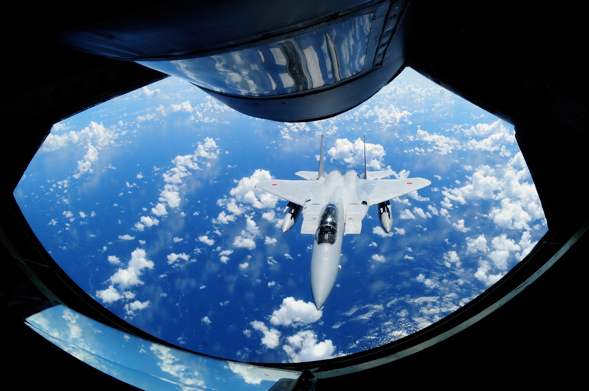 A Japan Air Self Defense Force F-15 is refueled by a U.S. Air Force KC-135 from the 909th Air Refueling Squadron, Kadena Air Base, during air refueling training July 30. The training is in preparation for JASDF participation in Red Flag Alaska this year.
(U.S. Air Force photo/Tech. Sgt. Angelique Perez) 