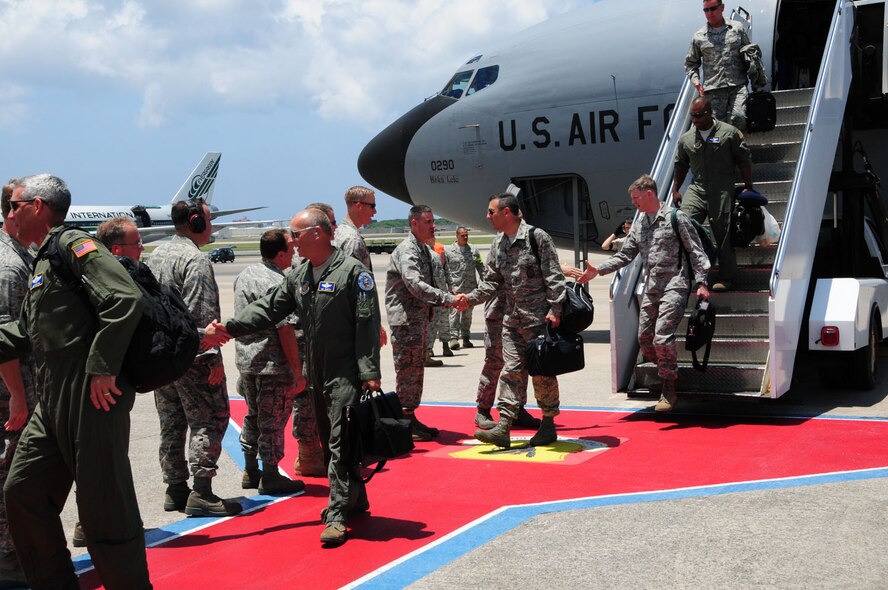 Members of the Pacific Air Forces Inspector General team arrive at Kadena Aug. 1. The team was here as part of the PACAF Unit Compliance Inspection which ended Aug. 7. Kadena leadership learned Aug. 11 that the 18th Wing passed the inspection. (U.S. Air Force photo/Staff Sgt. Lakisha Croley) 
