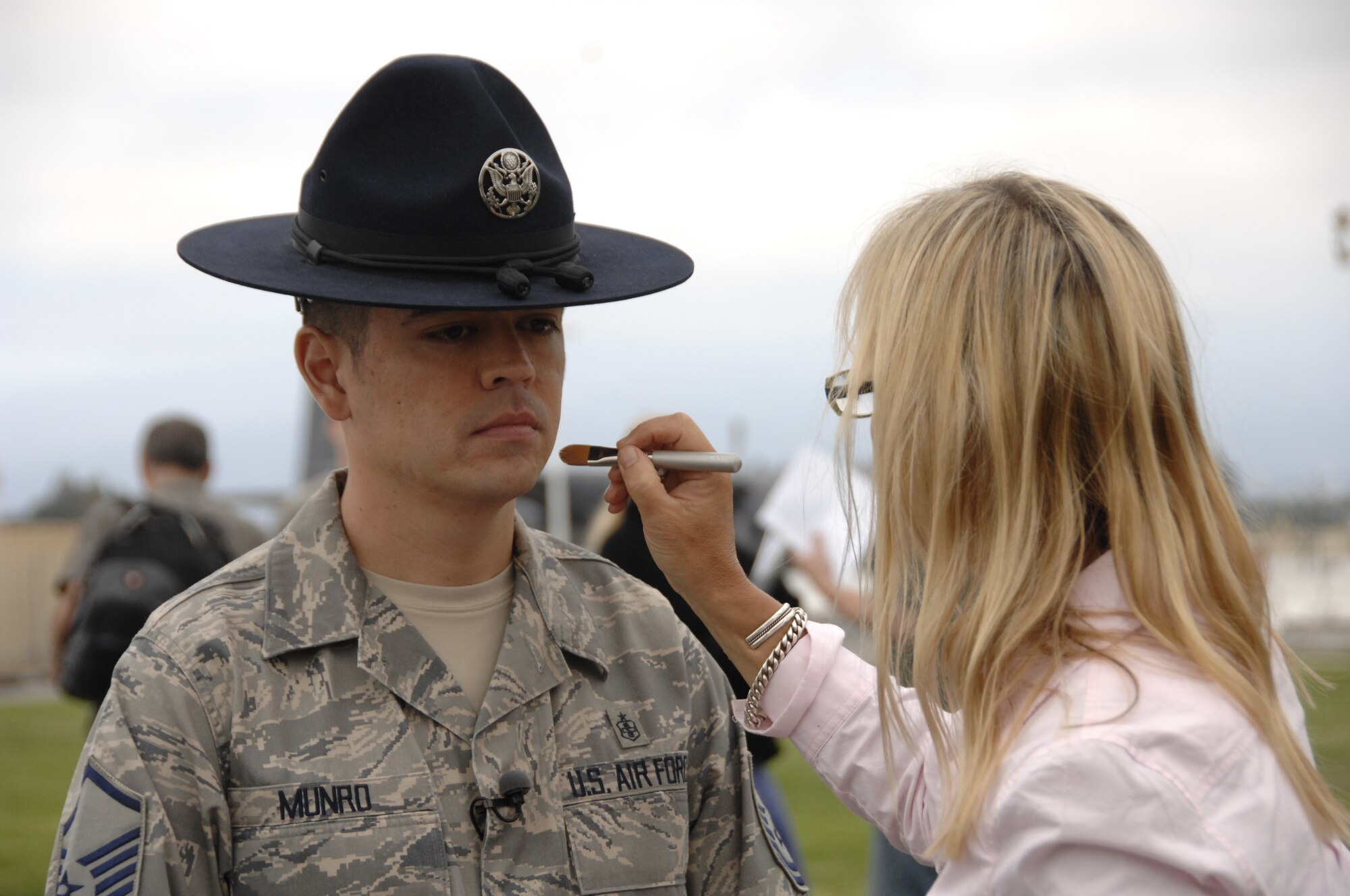 Master Sgt. Alan Munro, a former military training instructor and a member of the 129th Medical Group, has make-up applied by make-up artist, Pauline Berry, during a photo shoot for the redesign of GoANG.com at Moffett Federal Airfield, Calif., Aug. 1, 2009.  (Air National Guard photo by Tech. Sgt. Ray Aquino)