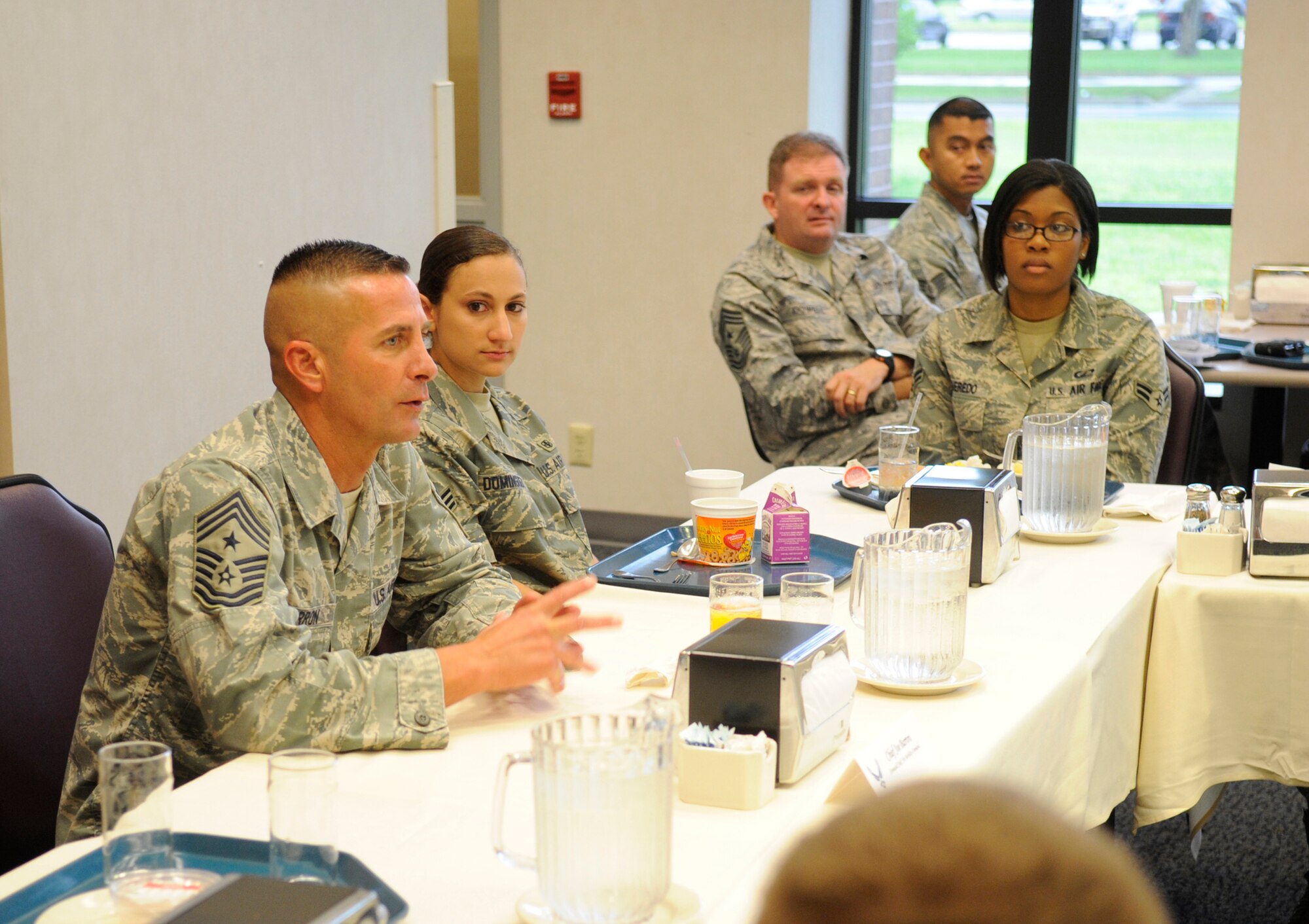 Command Chief Master Sgt. Joseph Barron, Jr., Air Mobility Command, has breakfast with members of Joint Base McGuire-Dix-Lakehurst at Halvorsen Hall Dining Facility Aug. 6. This is the chief’s first visit to the base since it became joint; he will be here through Aug. 7. (U.S. Air Force photo/Carlos Cintron)