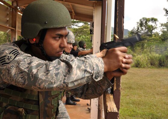 Staff Sgt. Jonathan Ariola, 624th Civil Engineer Squadron, hones his marksmanship skills July 12, 2009, at the Combat Arms Training and Maintenance range Schofield Barracks, Hawaii. Sergeant Ariola and 53 other squadron reservists were mobilized for six months and sent to Bagram Airfield, Afghanistan, to support the U.S. Army. (U.S. Air Force photo/Master Sgt. Daniel Nathaniel)