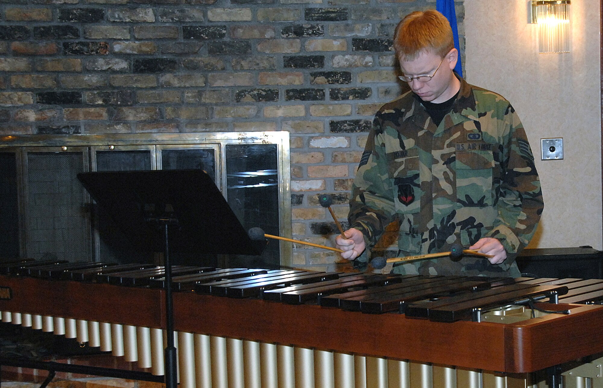 OFFUTT AIR FORCE BASE, Neb.-- Staff Sgt. David Pojar, a percussionist with the Heartland of America Band, plays the marimba during the July 31 Lunch Bachs concert at the Community Activity Center. The Lunch Bach is a free four-part series during the Offutt lunch hour. US Air Force photo by Kendra Williams