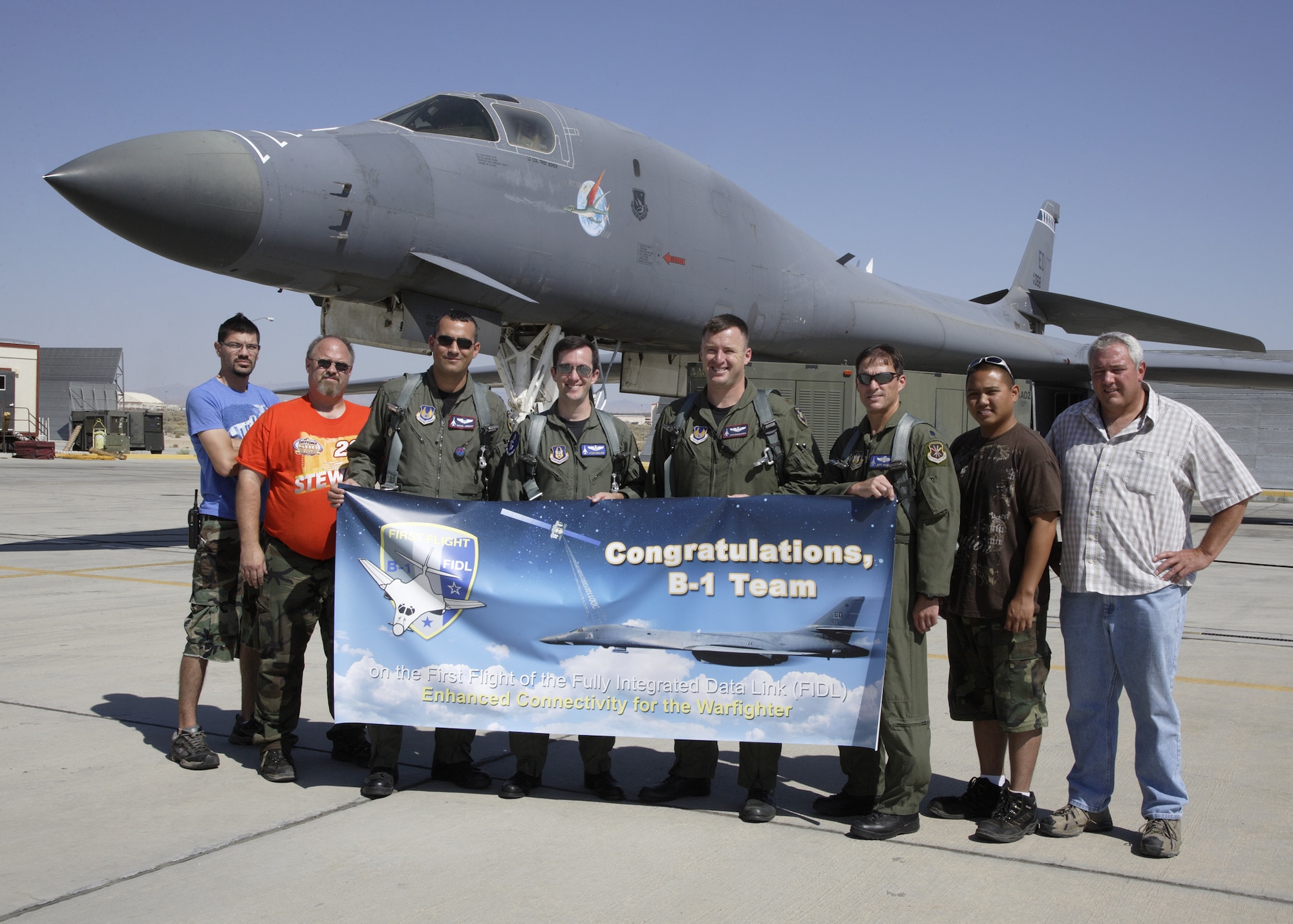 The 419th Flight Test Squadron conducted the first functional check flight of a B-1B Lancer which underwent two years of modifications on Edwards AFB July 30.  The bomber was upgraded with the Fully Integrated Data Link which allows it to communicate quickly with others in the entire battlespace and allows it to become a more powerful asset to U.S. warfighters.  Both Air Force and Boeing testers at Edwards worked to develop and integrate the hardware and software that make up the FIDL system.  (Air Force photo/Chad Bellay)