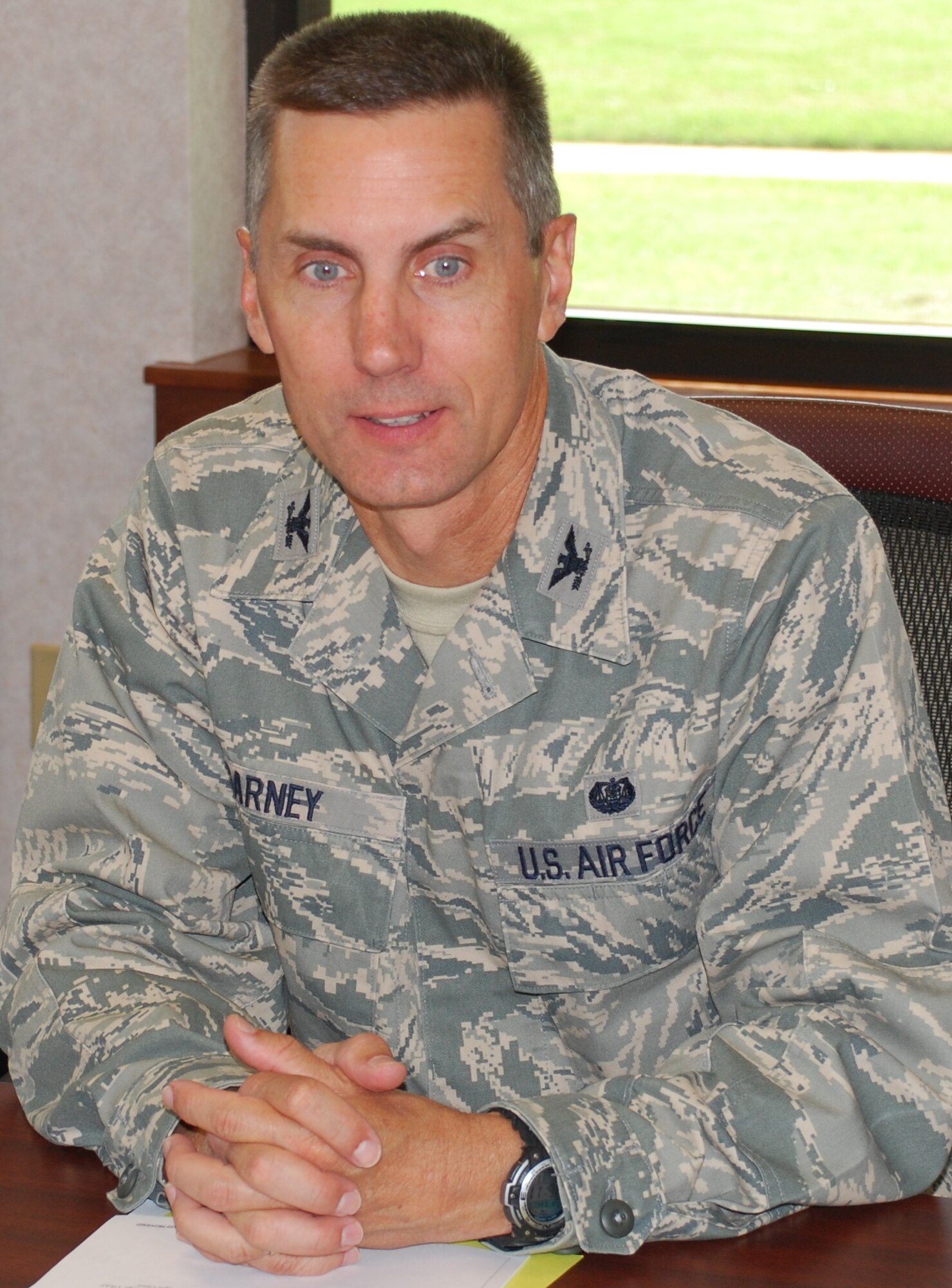 Col. Mark Garney, the new 82nd Training Wing staff judge advocate, explains the importance and purpose of lawyers to a client Aug. 5. Colonel Garney said he hopes to help smooth the road to success for Sheppard Airmen and leaders. (U.S. Air Force photo/Airman 1st Class Valerie Hosea) 