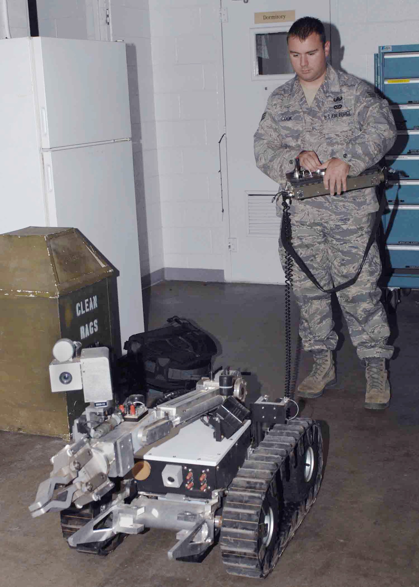 Senior Airman Michael Cook operates the HD-1 remote entry robot July 29 at Cannon Air Force Base, N.M. HD-1s are modeled robots, made by Remotech Andros, that assist in remote-entry situations and help keep danger at a distance. Airman Cook is a 27th Special Operations Civil Engineer Squadron explosive ordnance disposal member. (U.S. Air Force photo/Airman 1st Class James Bell) 