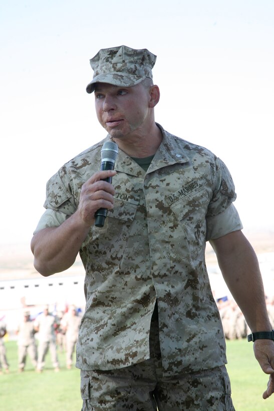 Lt. Col. Clay C. Tipton the new 3rd Battalion, 7th Marine Regiment’s commanding officer speaks to Marines, sailors, friends and family members during change of command and relief and appointment ceremonies Aug. 7 at the Combat Center’s Lance Cpl. Torrey L. Gray Field.