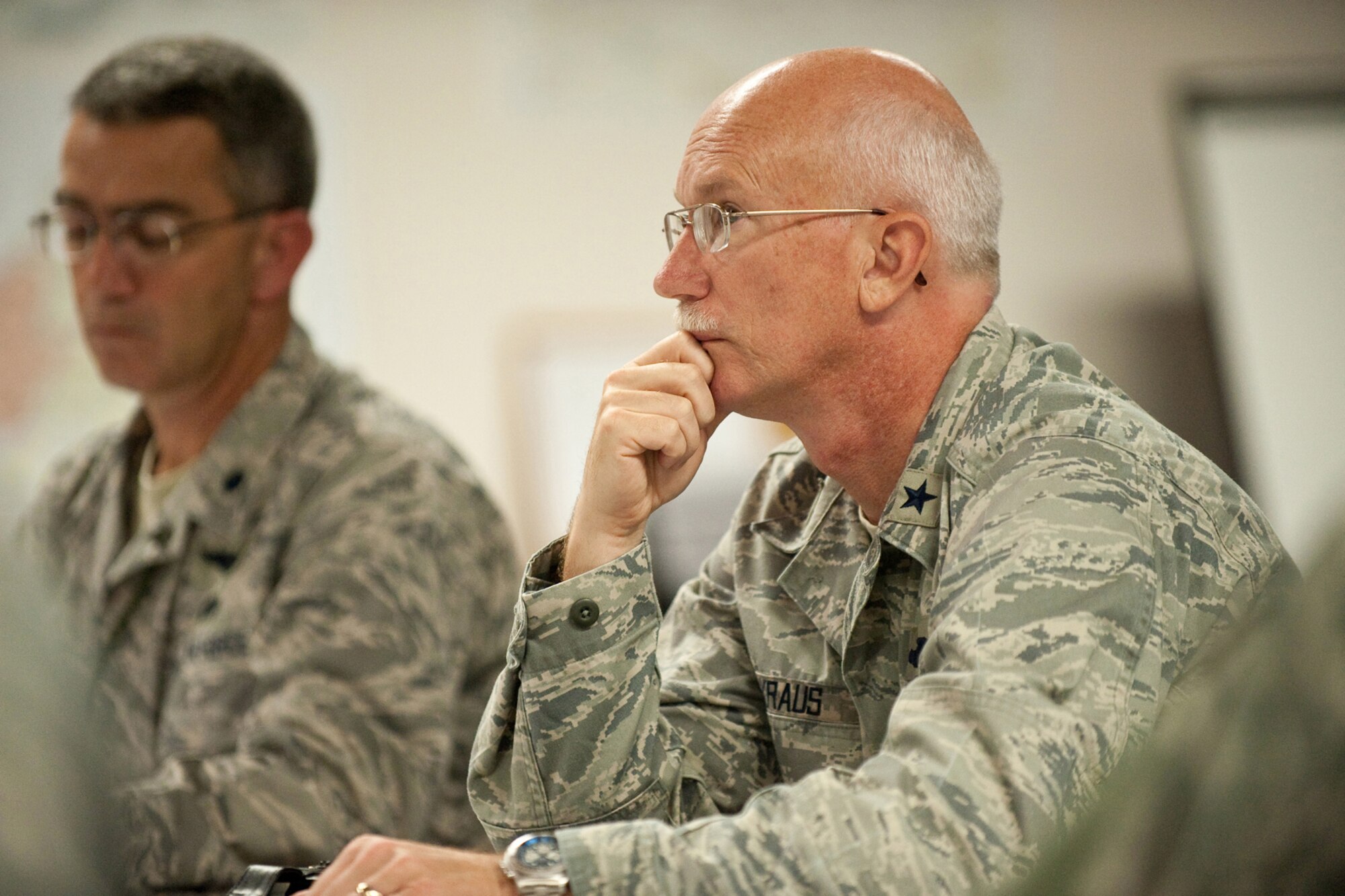 Brig. Gen. Mark Kraus, Joint Task Force Cardinal commander, analyzes the Guard's response to mortuary operations Aug. 5 as simulated casualty rates approach 7,000 during a pandemic-response exercise.