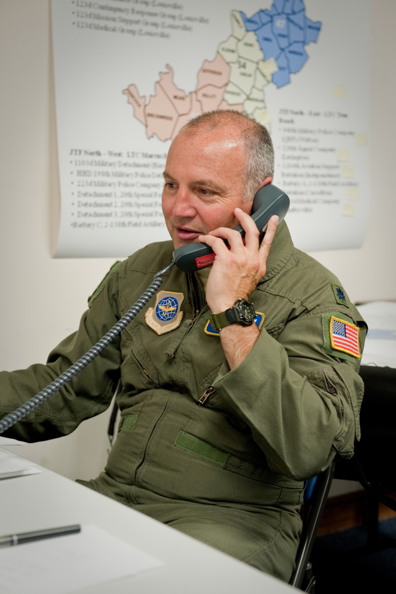 Lt. Col. Kevin Morris coordinates an airlift sortie to deliver troops as needed across the Commonwealth for the pandemic exercise.
