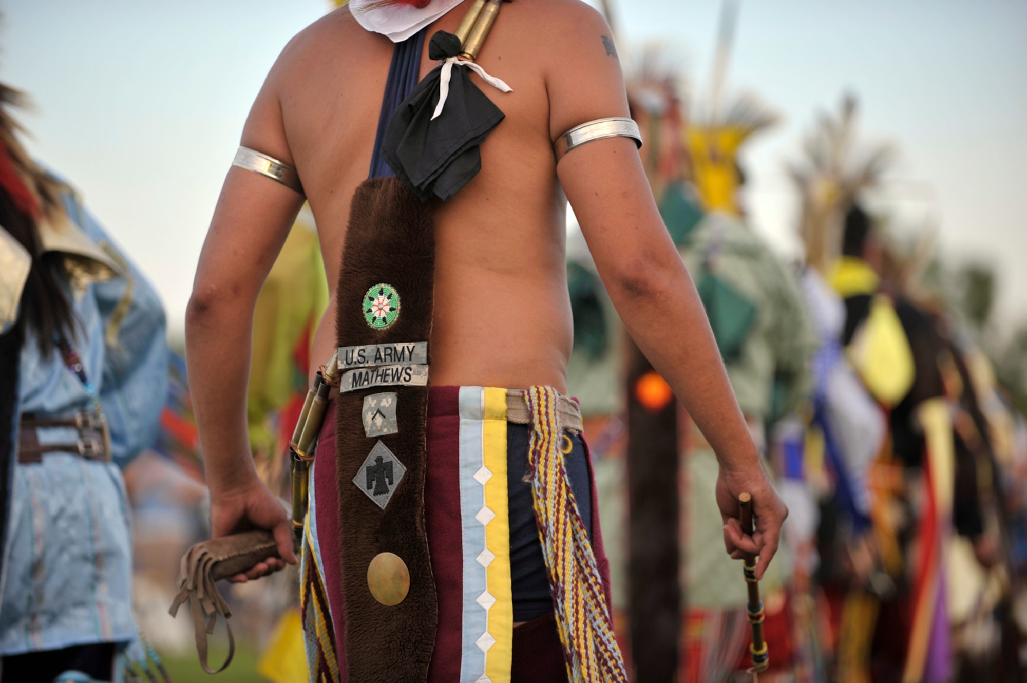 Pvt. Skyler Mathews proudly displays his U.S. Army membership on his traditional Kanza dress at the annual pow wow of his tribe, the Kaw Nation, near Kaw City, Okla., on Aug. 2, 2009. Pvt. Mathews is an infantryman in a National Guard unit in Ponca City, Okla. (U.S. Air Force photo/Tech. Sgt. Jason Schaap) 