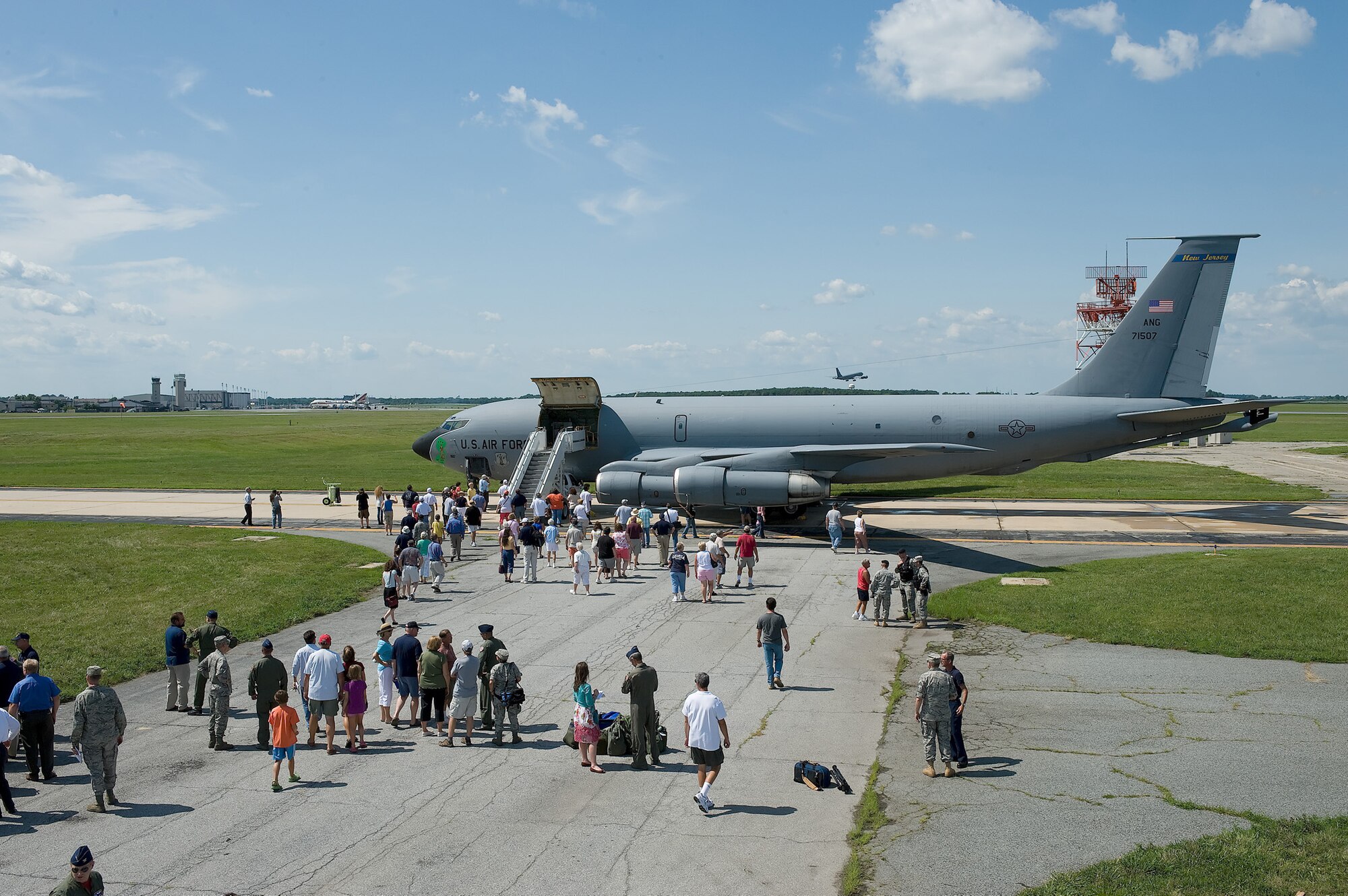 Visitors gather around the Air Mobility Command Museum's latest aircraft, a KC-135E Stratotanker.  (U.S. Air Force Photo/Jason Minto)