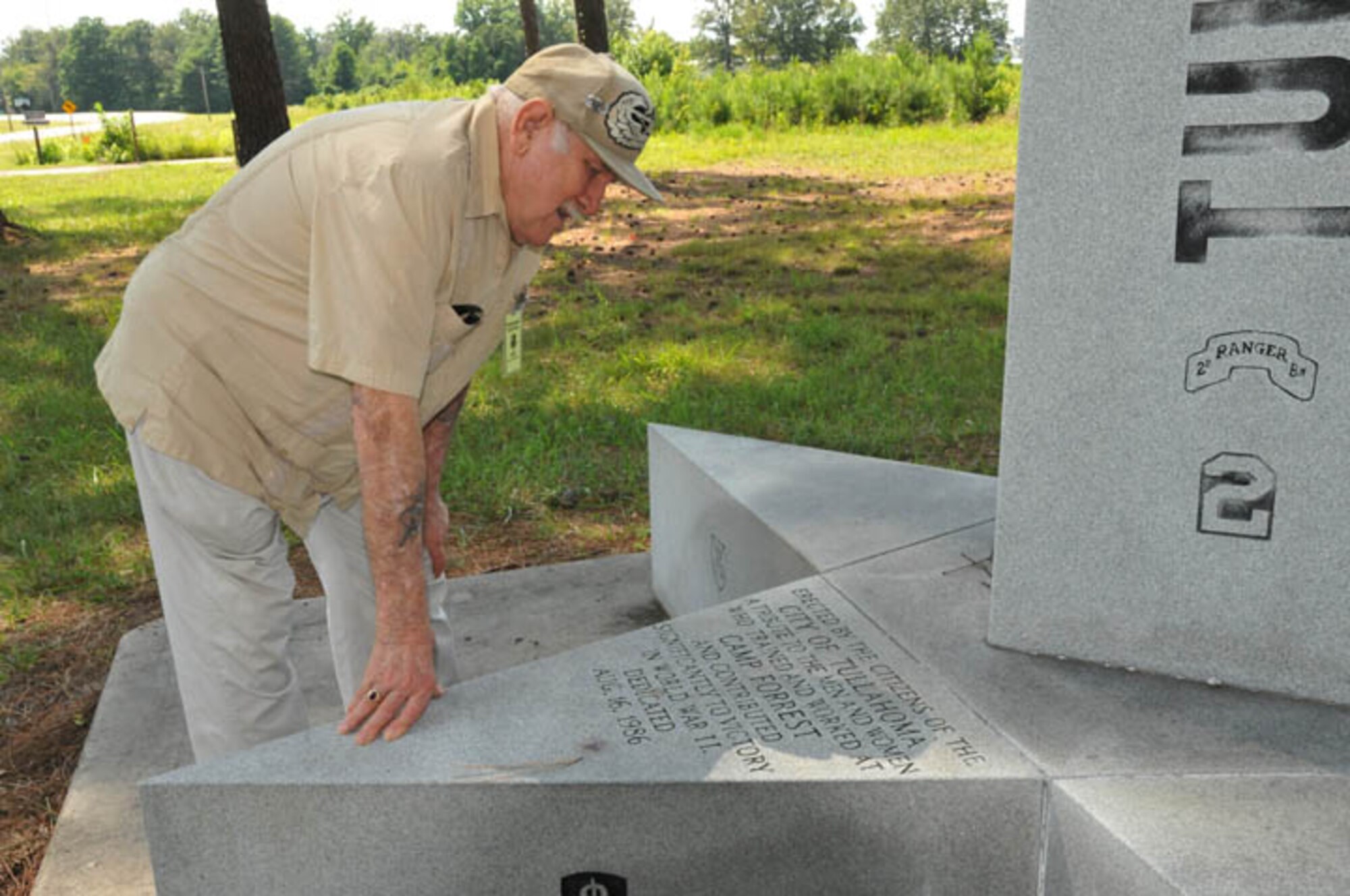 Jack Ariola, a Camp Forrest trainee, came back for a visit 65 years later after training at the Army’s largest training facility during World War II. Ariola looks at the monument, which is placed on some of the old grounds on Wattendorf Highway, that pays tribute to all the trainees. Ariola was training to be a glider operator in the Army’s 194th Glider Infantry Regiment. (Photo by David Housch)