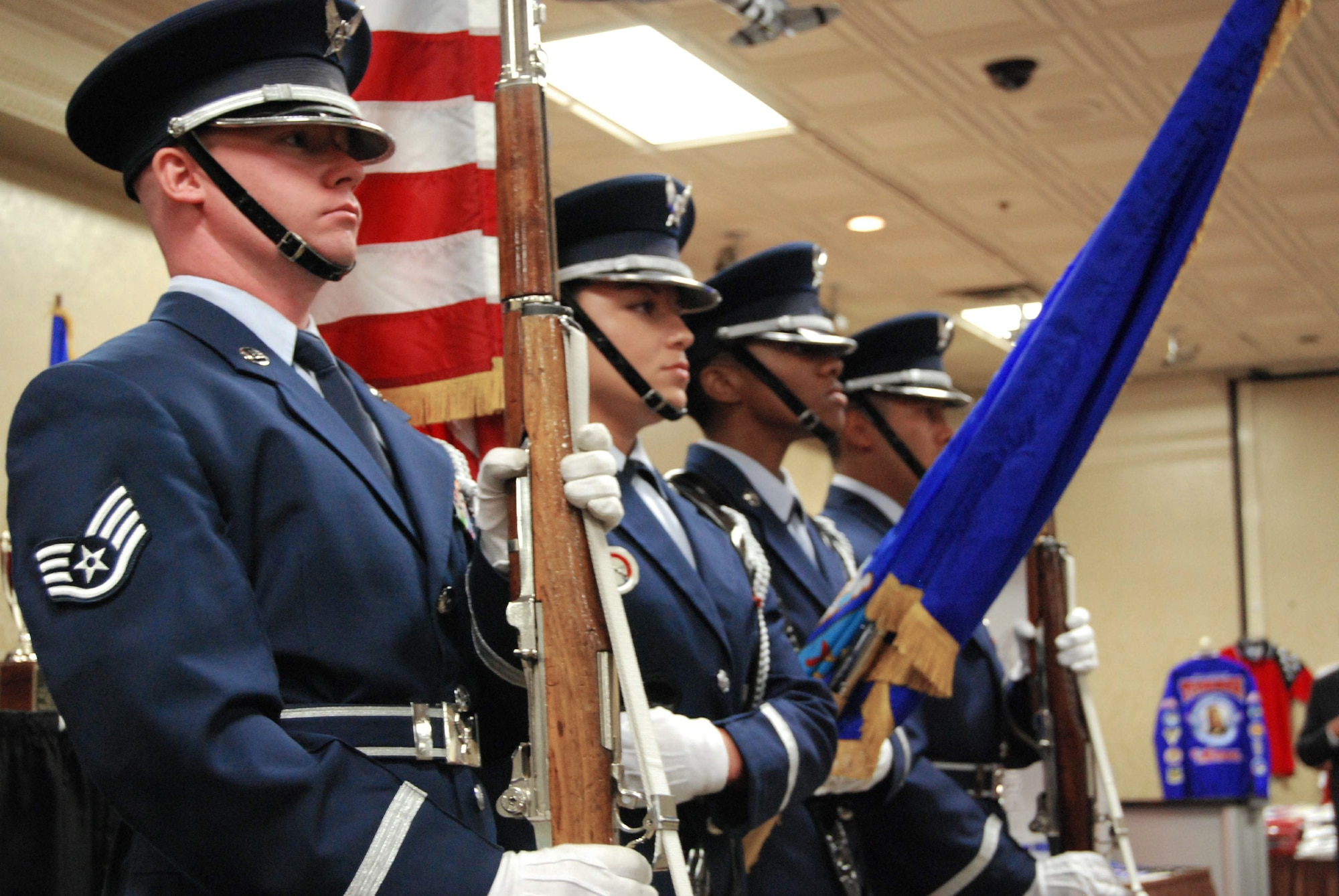 Nellis Air Force Base Honor Guard members post the colors during the Top Guns award ceremony Aug. 6 at the Palace Station Hotel in Las Vegas. The ceremony was part of the 38th Annual Tuskegee Airman Inc. National Convention Aug. 6 through 9. (U.S. Air Force photo/Tech. Sgt. Amaani Lyle)