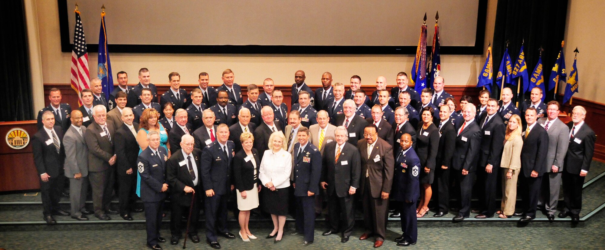 MacDill leadership and Tampa civilians gather for the evening's Honorary Commanders event at the Davis Conference Center here July 31. Each squadron under the 6th Air Mobility Wing and 927th Air Refueling Wing appointed a local civilian as their honorary commander.  (U.S. Air Force photo by, Airman 1st Rylan Albright/Released)