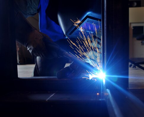Senior Airman Matthew Thibodeaux, 36th Maintenance Squadron aircraft metals technician, welds and assembles a heavy stores adaptor beam at Andersen Air Force Base, Guam, July 31. The New Orleans, LA., native is deployed from Barksdale AFB, La., to support U.S. Pacific Command’s Theater Security Package and Continuous Bomber Presence missions in the Asia-Pacific region.  (U.S. Air Force photo/Senior Airman Christopher Bush)