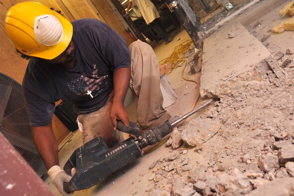 EGLIN AIR FORCE BASE, Fla. --  Construction workers turn concrete into rubble during an extensive renovation and expansion effort to upgrade the Eglin Commissary Aug. 6. Scheduled for completion in the summer of 2010, the 19-month project hopes to better meet the needs of the customer and update many of the aging areas in the building. This means expansion of the sales floor by 6,000 square feet, second commissary entrance, parking area and roof. (U.S. Air Force photo/ Airman Anthony Jennings)
