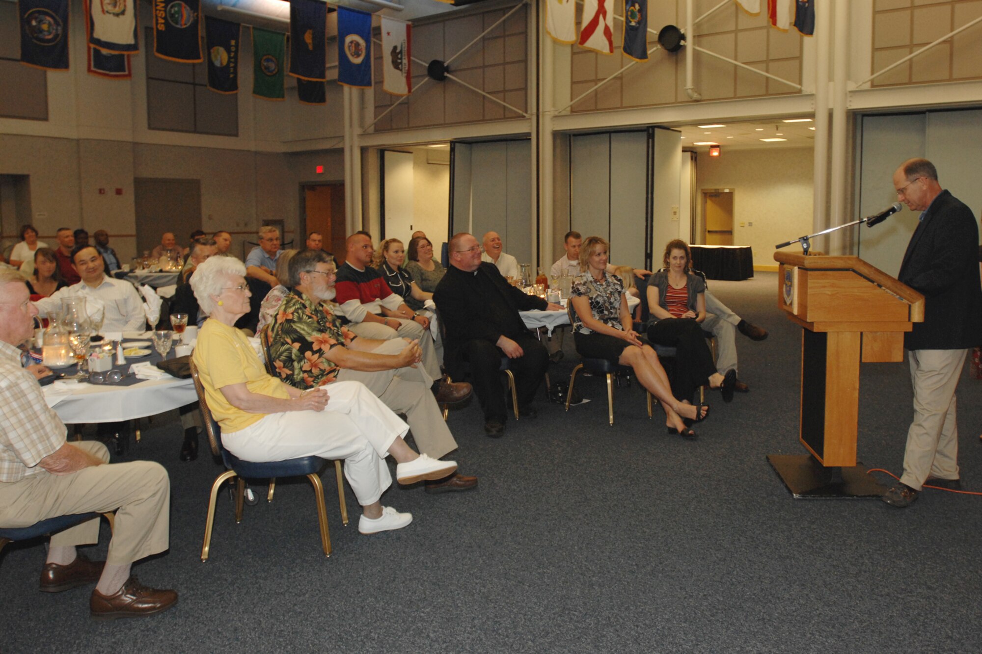 Lt. Col. Michael Williams, 22nd Air Refueling Wing chaplain, speaks during his retirement dinner at McConnell AFB, Kan., on July 29. Colonel Williams retired after 24 years of military service. (U.S. Air Force photo/Staff Sergeant Jamie Train)