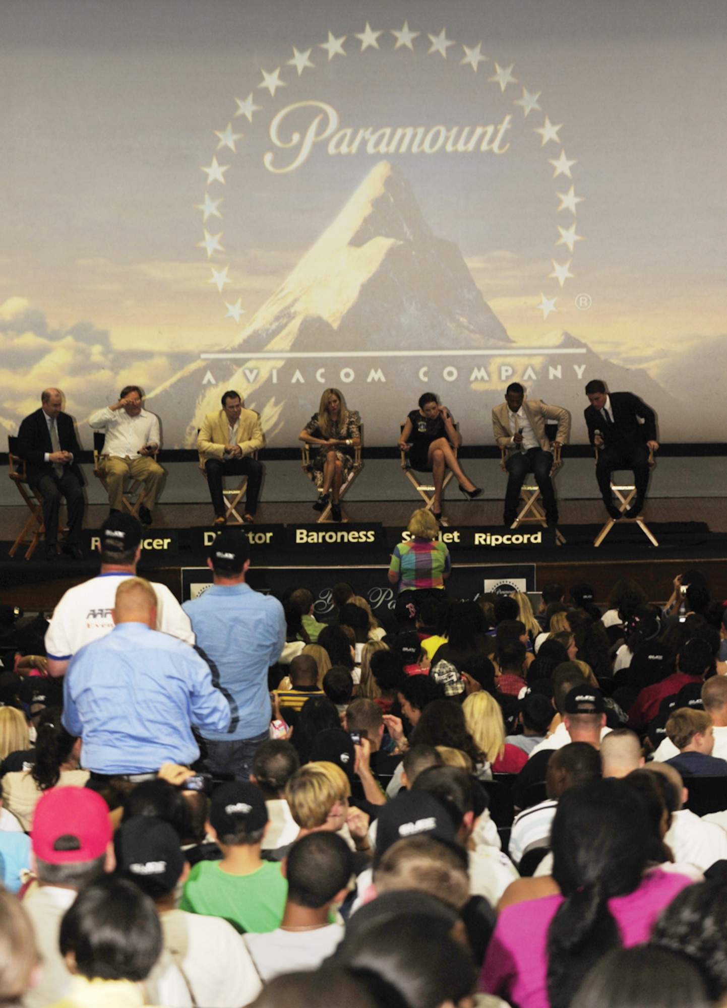More than 950 spectators gather in the Andrews base theater for a question and answer session with the director, producer, and cast of "G.I Joe: The Rise of Cobra” July 31. In attendance were vice chairman Paramount Motion Pictures Group, Rob Moore, producer Lorenzo di Bonaventura, director Steven Sommers, and actors Channing Tatum, Marlon Wayans, Sienna Miller and Rachel Nichols. (U.S. Air Force photo/ Staff Sgt. Keyonna Fennell)