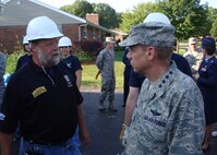 BEAVERCREEK, Ohio -- A builder from Coventry Fine Homes describes the plans for the new house to General Hoffman, commander of Air Force Materiel Command.  (Air Force photo by Ron Fry)