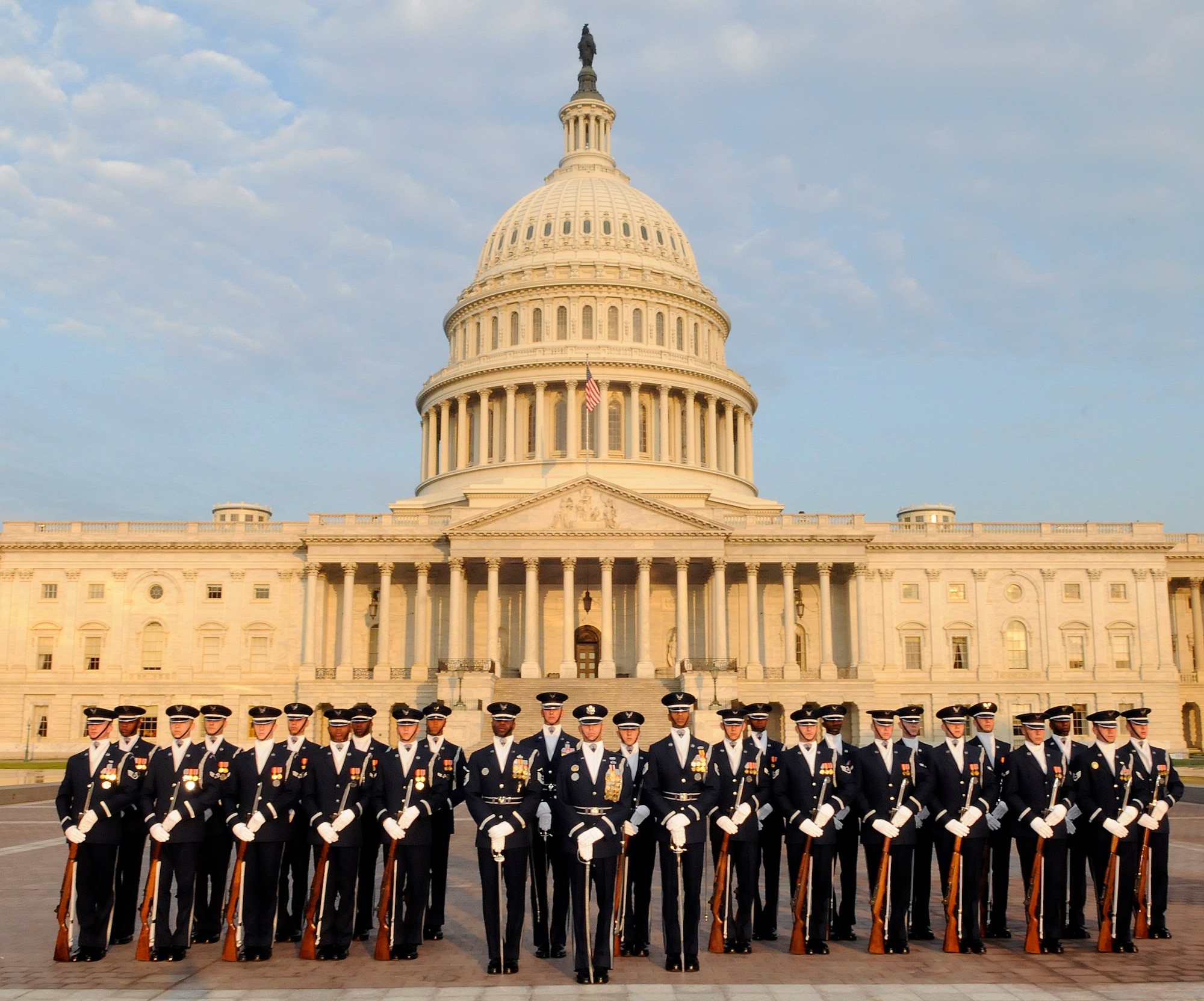 The U.S. Air Force Honor Guard Drill Team stands on the steps of the United States Capitol Building in Washington, D.C. The Drill Team is the traveling component of the United States Air Force Honor Guard. The team helps promote the Air Force mission among military and civilian audiences through its complex drill routine. The Drill Team personifies the integrity, discipline, teamwork and professionalism of the Air Force in all they do. During the Honor Guard’s 60-year history, the Drill team has performed in every state of the union and many countries abroad. (U.S. Air Force photo by Staff Sgt. Daniel DeCook)