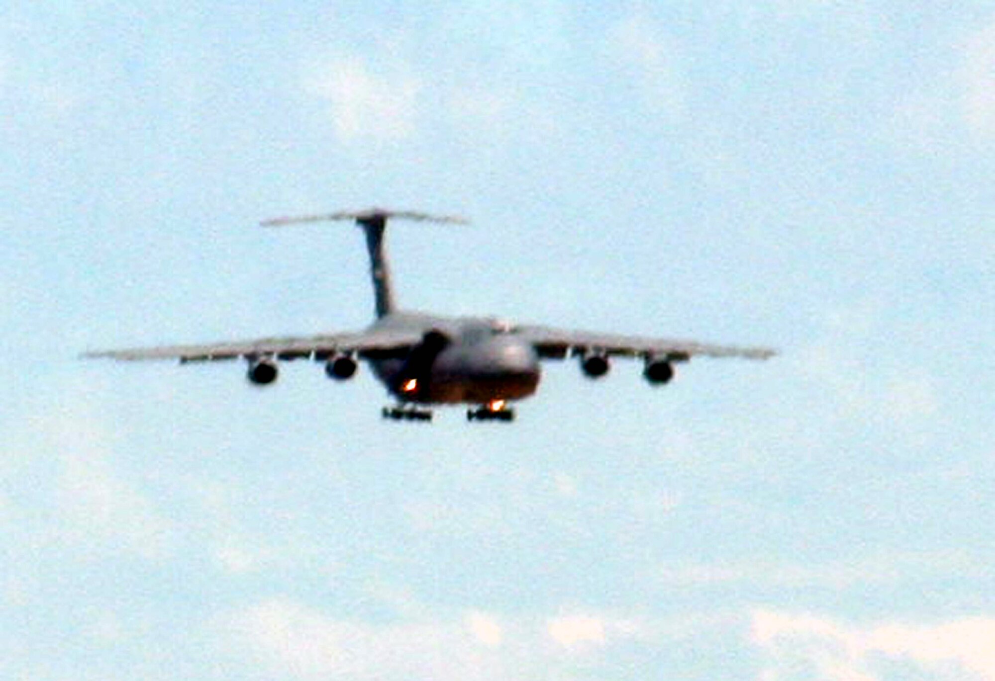 A C-5 Galaxy from the 60th Air Mobility Wing comes in for a landing at Travis Air Force Base, Calif., on Aug. 5, 2009. The C-5 is Air Mobility Command's and the Air Force's largest airlift plane.  The C-5 can carry more than any other airlifter. It has the ability to carry 36 standard pallets and up to 81 troops simultaneously. (U.S. Air Force Photo/Tech. Sgt. Scott T. Sturkol)