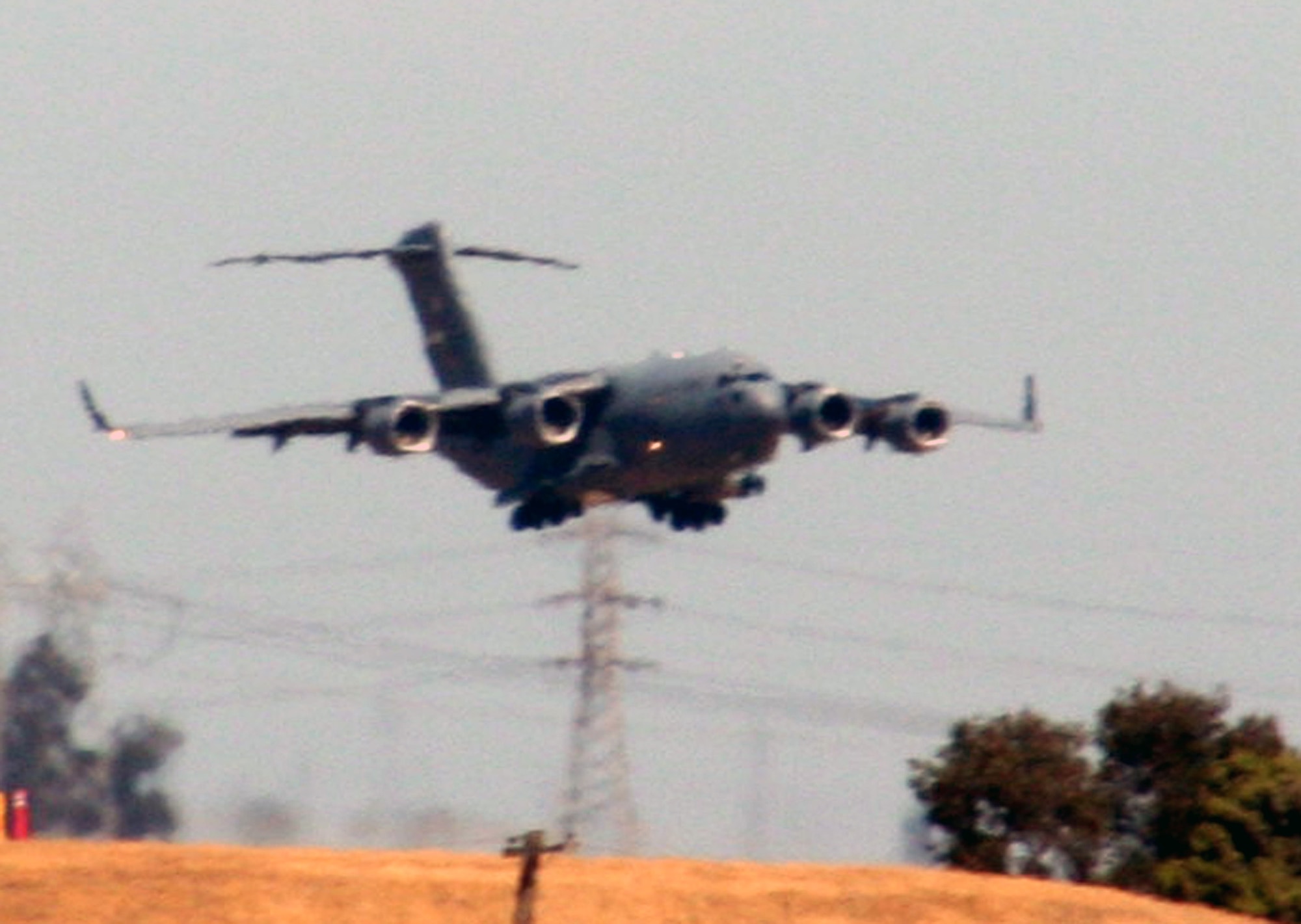 A C-17 Globemaster III from the 60th Air Mobility Wing comes in for a landing at Travis Air Force Base, Calif., on Aug. 5, 2009. (U.S. Air Force Photo/Tech. Sgt. Scott T. Sturkol)