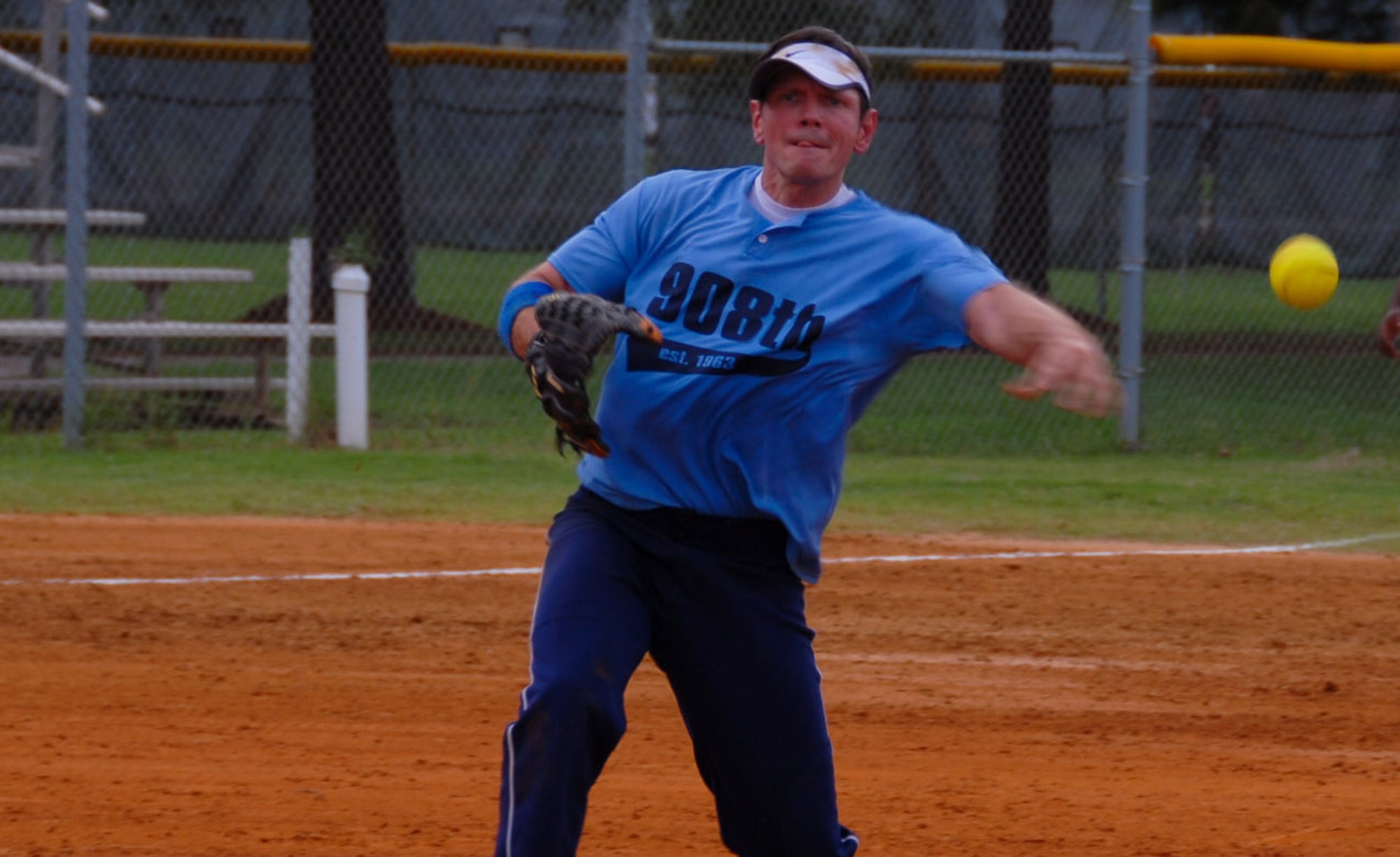 Master Sgt. Mark Naglic from the 908th Airlift Wing was the winning pitcher of both games during the Maxwell-Gunter intramural softball championship July 30. The 908th won the championship game against the Electronic Systems Group to capture the title. (U.S. Air Force photo/Jamie Pitcher)