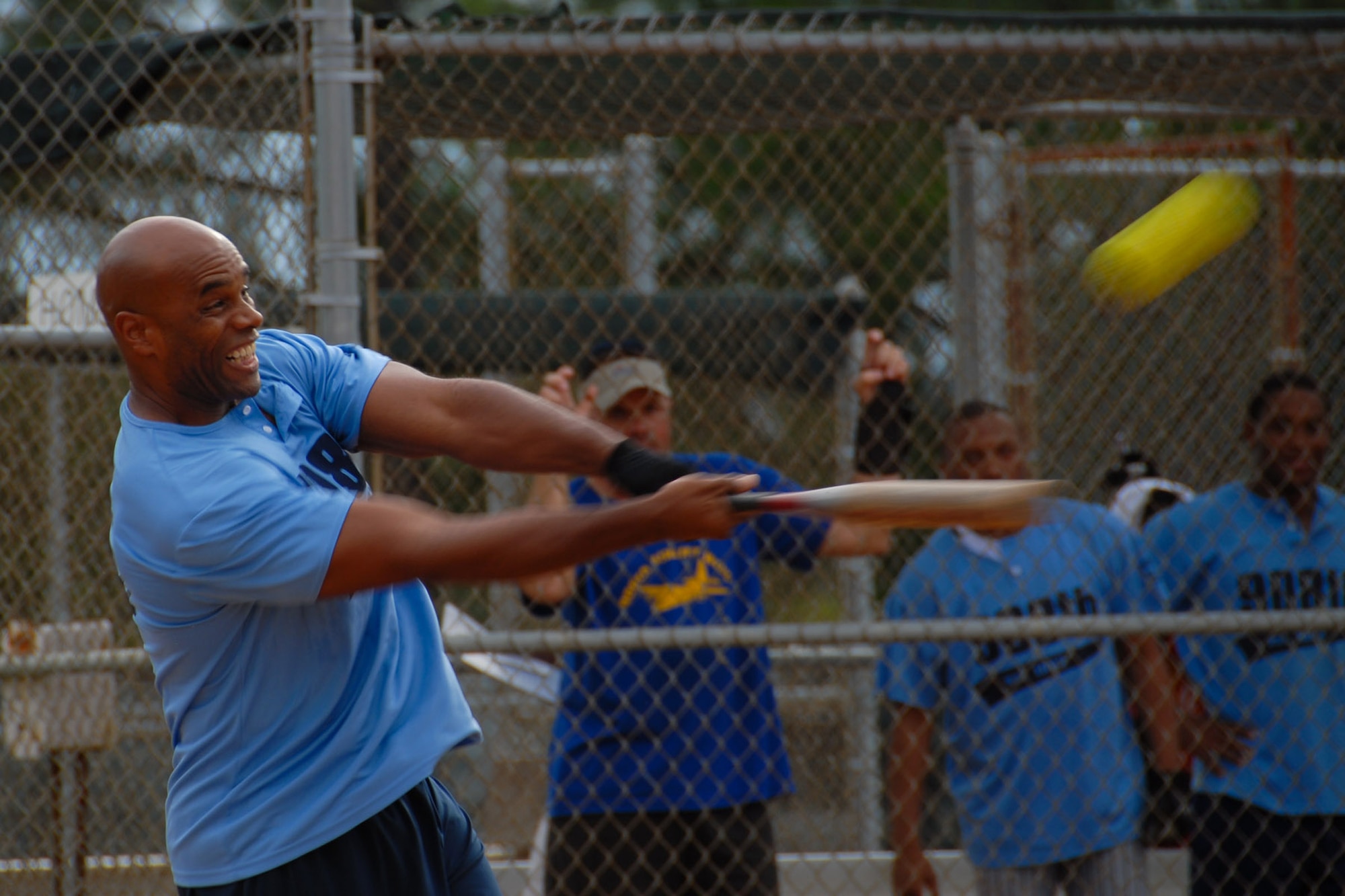 Senior Master Sgt. Sammy Gipson of the 908th Airlift Wing slams a home run during the Maxwell-Gunter intramural softball championship game July 30 at Maxwell's softball complex. The 908th went on to win the championship for the second consecutive year. (U.S. Air Force photo/Jamie Pitcher)