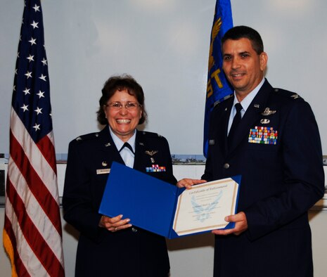 Col Bert A Silich, 927th ASTS, retires after 30 years of service in the Air Force Reserves.
