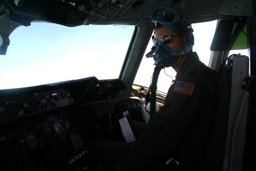 Lt. Col. Chad Johnson, a KC-10 Extender pilot from the 9th Air Refueling Squadron at Travis Air Force Base, Calif., flies a KC-10 back to California from Scott Air Force Base, Ill., on Aug. 4, 2009.  The KC-10 is one of Air Force's and Air Mobility Command's air refueling aircraft that helps provide global reach and the Air Force to fly, fight and win...in air, space and cyberspace.  (U.S. Air Force Photo/Tech. Sgt. Scott T. Sturkol)