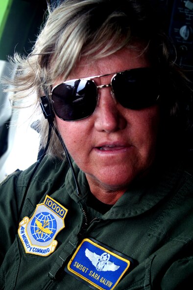 Senior Master Sgt. Sara Galvin, a KC-10 Extender flight engineer from the 9th Air Refueling Squadron at Travis Air Force Base, Calif., prepares a KC-10 for a flight back to California while stopped at Scott Air Force Base, Ill., on Aug. 4, 2009.  The KC-10 is one of Air Force's and Air Mobility Command's air refueling aircraft that helps provide global reach and the Air Force to fly, fight and win...in air, space and cyberspace.  Sergeant Galvin has more than 10,000 flying hours as a flight engineer. (U.S. Air Force Photo/Tech. Sgt. Scott T. Sturkol)