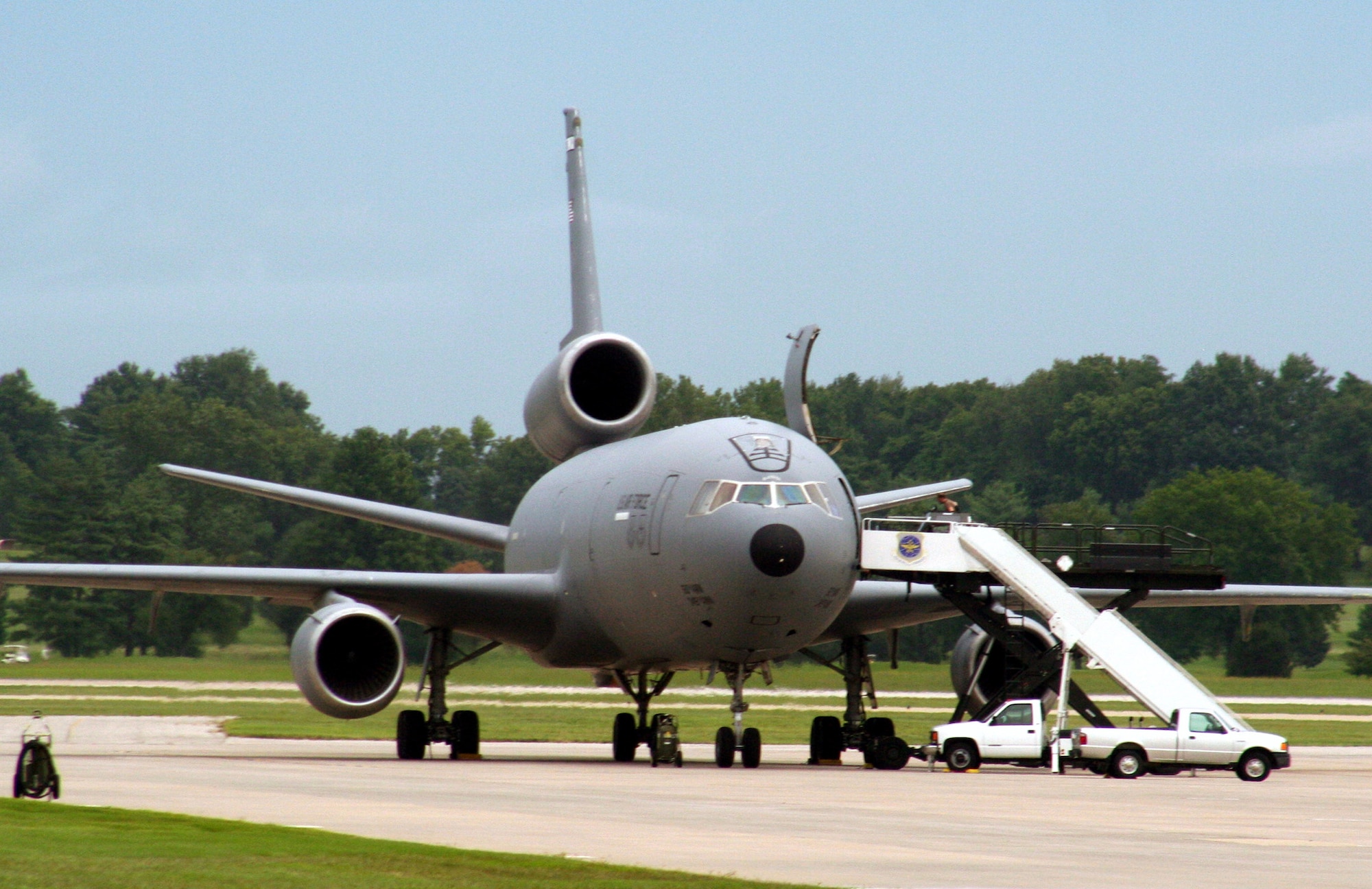 A KC-10 Extender from the 60th Air Mobility Wing, Travis Air Force Base, Calif., is being prepared for a flight back to California while stopped at Scott Air Force Base, Ill., on Aug. 3, 2009.  The KC-10 is one of Air Force's and Air Mobility Command's air refueling aircraft that helps provide global reach and the Air Force to fly, fight and win...in air, space and cyberspace.  (U.S. Air Force Photo/Tech. Sgt. Scott T. Sturkol)