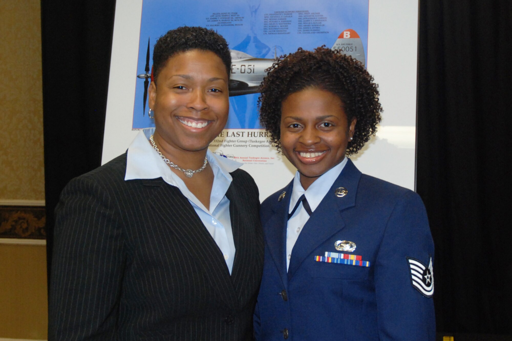 Vernice Armour, America’s First African American Female Combat Pilot greets Tech. Sgt. Larysa S. Lewis, chief, installation personnel readiness, 94th Mission Support Squadron at the 38th Annual Tuskegee Airmen Inc. Nation Convention, Palace Station Hotel, Las Vegas NV. Aug 6. Armour is a keynote speaker, author and coach. (U.S. Air Force photo/Tech. Sgt. James Branch)