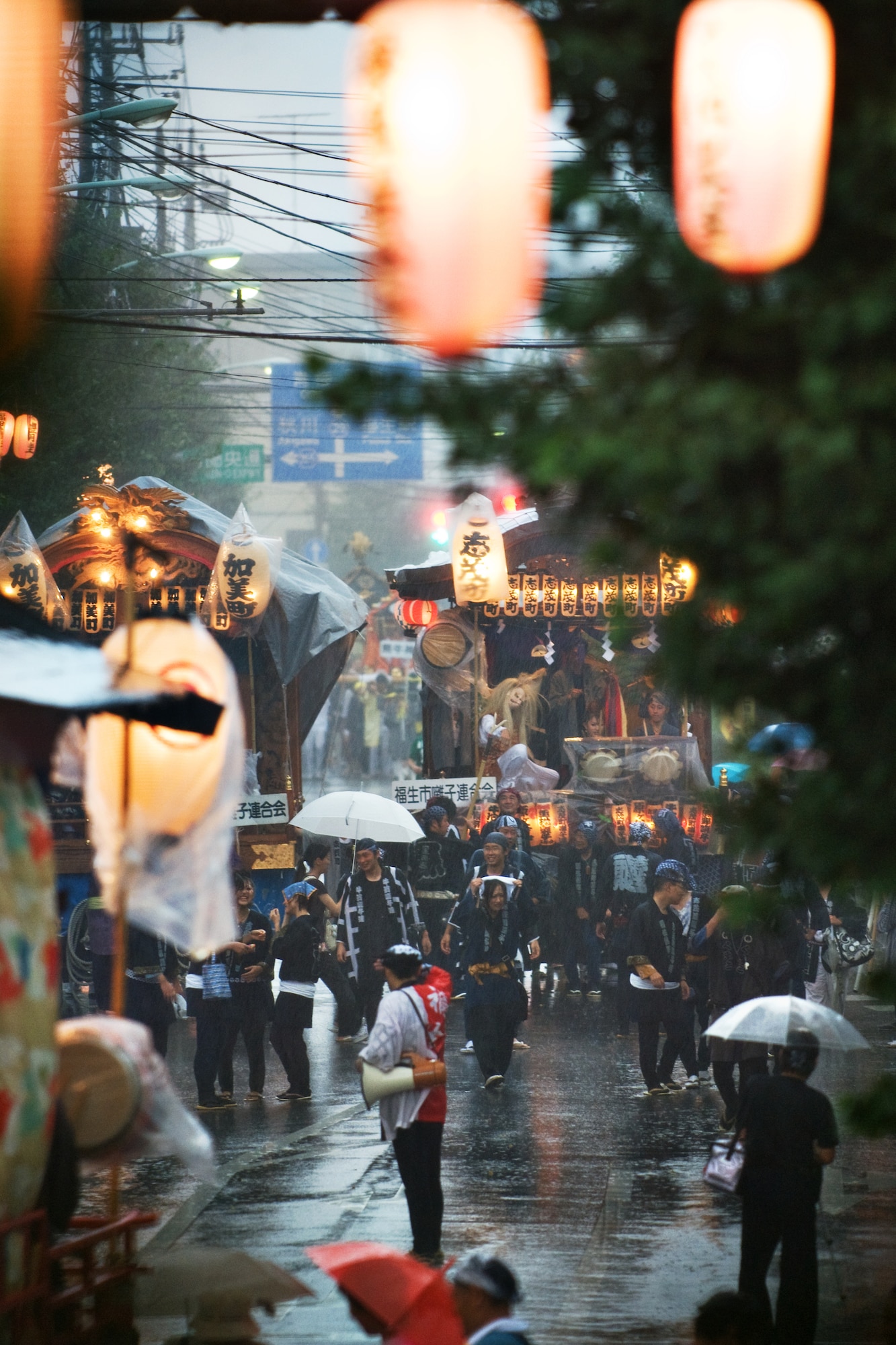 FUSSA, Japan – Airmen from Yokota Air Base carry a portable Shinto shrine during the 59th Annual Fussa Tanabata Festival Aug. 7. The shrine, called a Mikoshi, translates as “cloud burst” in English. More than 40 Airmen carry the shrine each year during the festival, also known as the “star festival.” According to Chinese legend, the two stars Altair and Vega, usually separated from each other by the Milky Way galaxy, meet up in the night sky on the same day each year. (U.S. Air Force photo/Osakabe Yasuo)