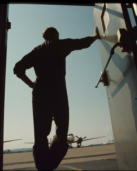 Looking out on the flight line from the old Stambaugh hangar at the Harrisburg International Airport Middletown, Pa, this then 193rd Tactical Electric Warfare Group Pa. Air National Guard member poses for this picture in the early 1970's.